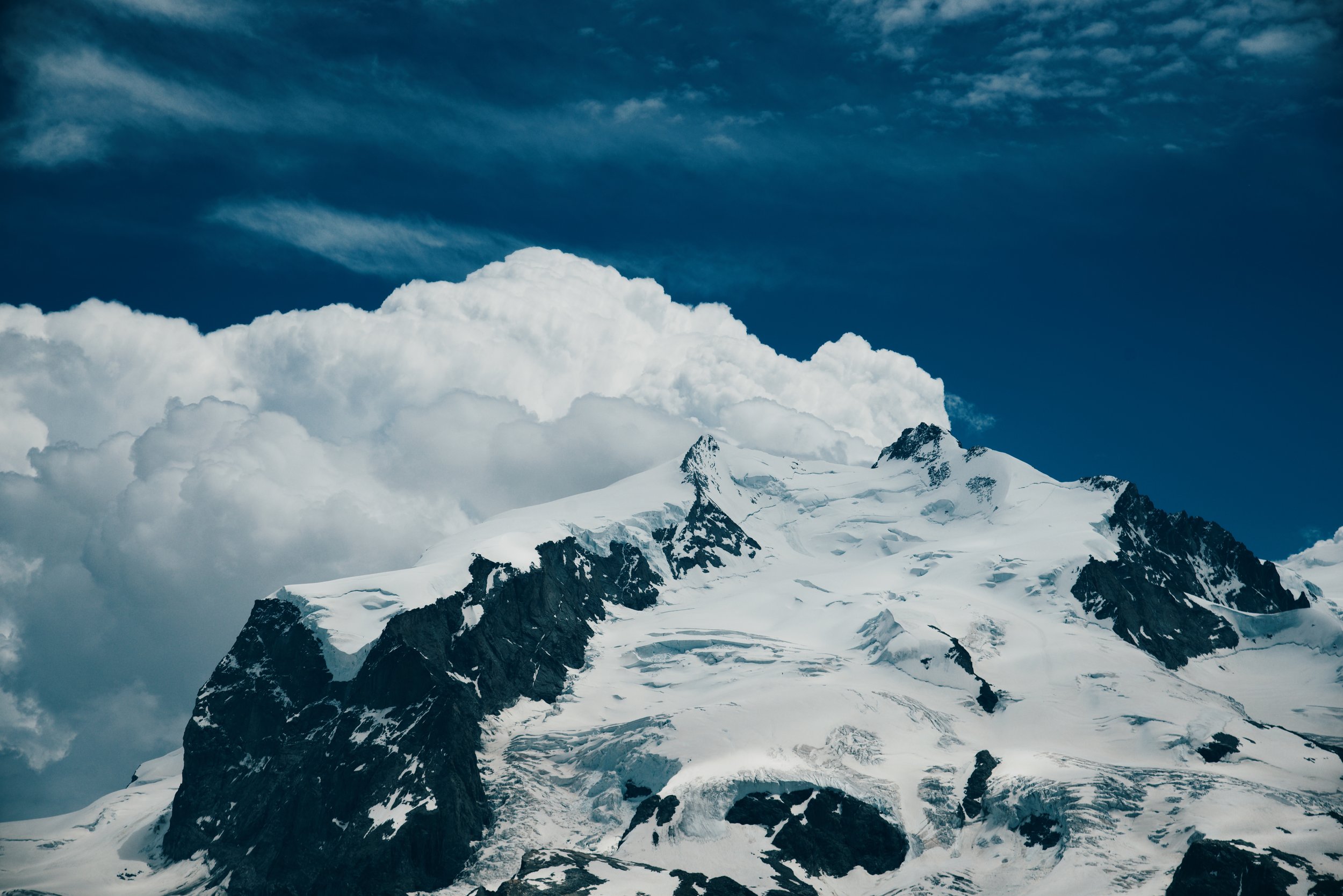 Clouds Behind Mountain Switzerland.JPG