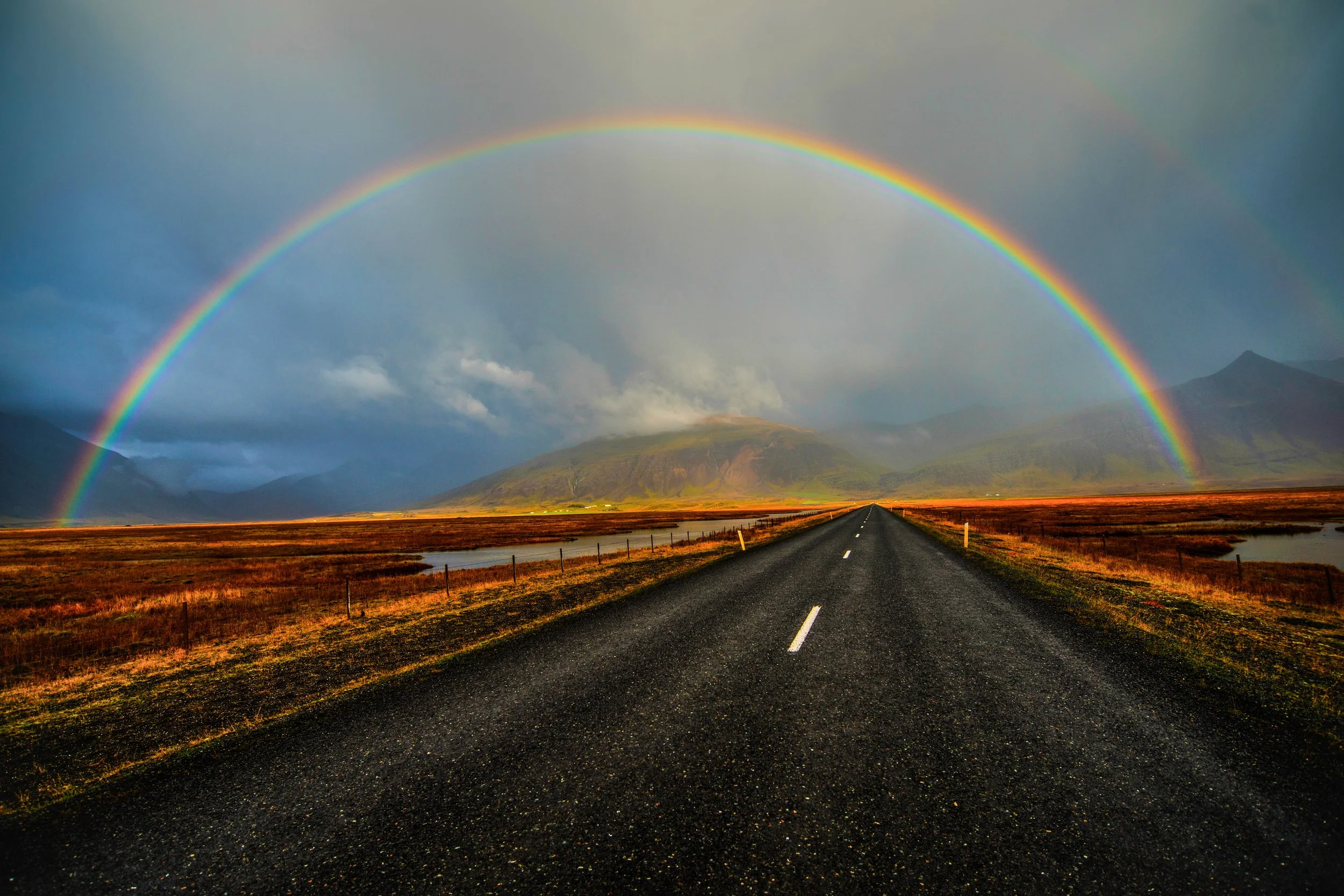 Rainbow Over Road with Nice Light in Iceland-2.jpg