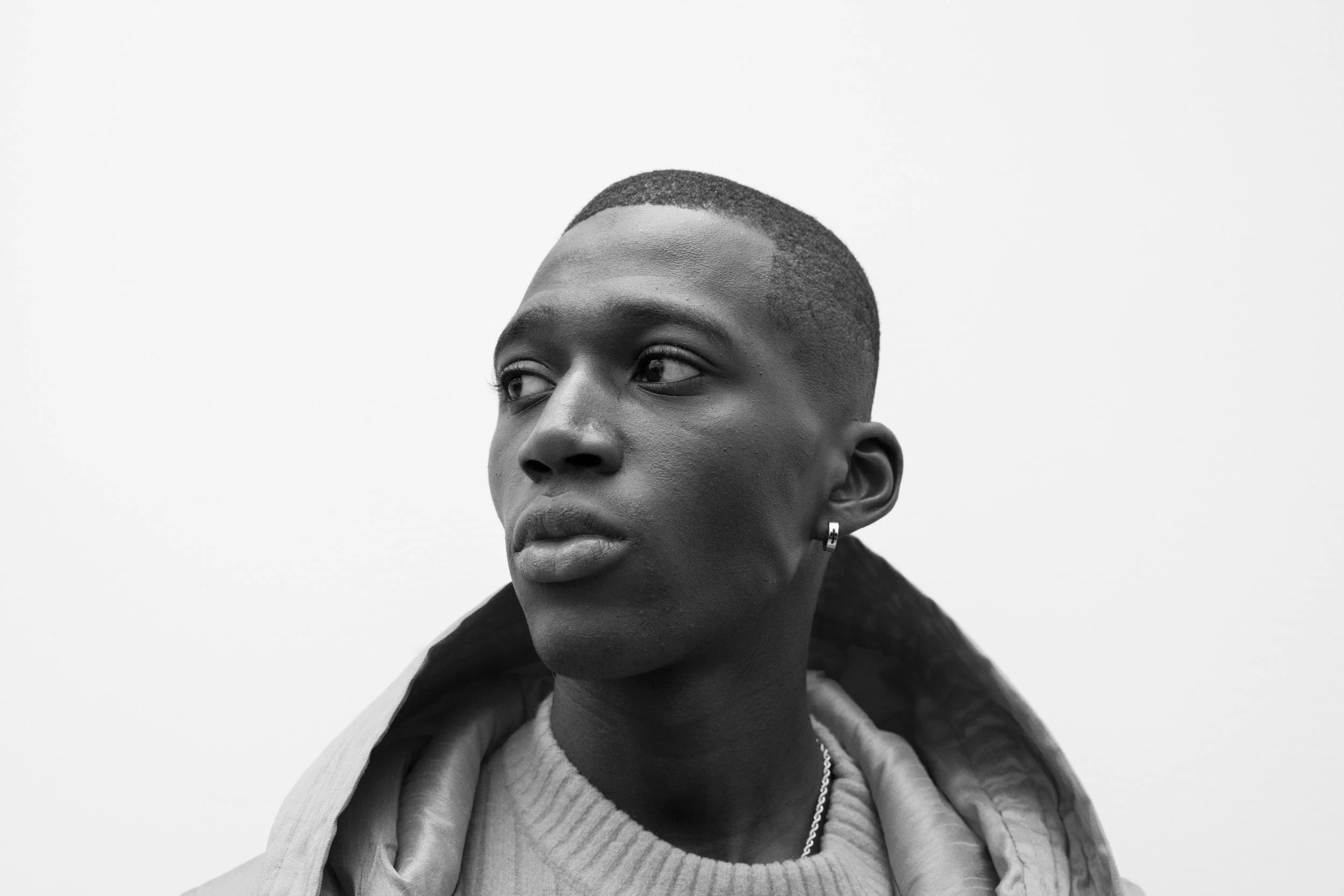 Ahiman Looks to Side Portrait B&W NYFW NYC.JPG