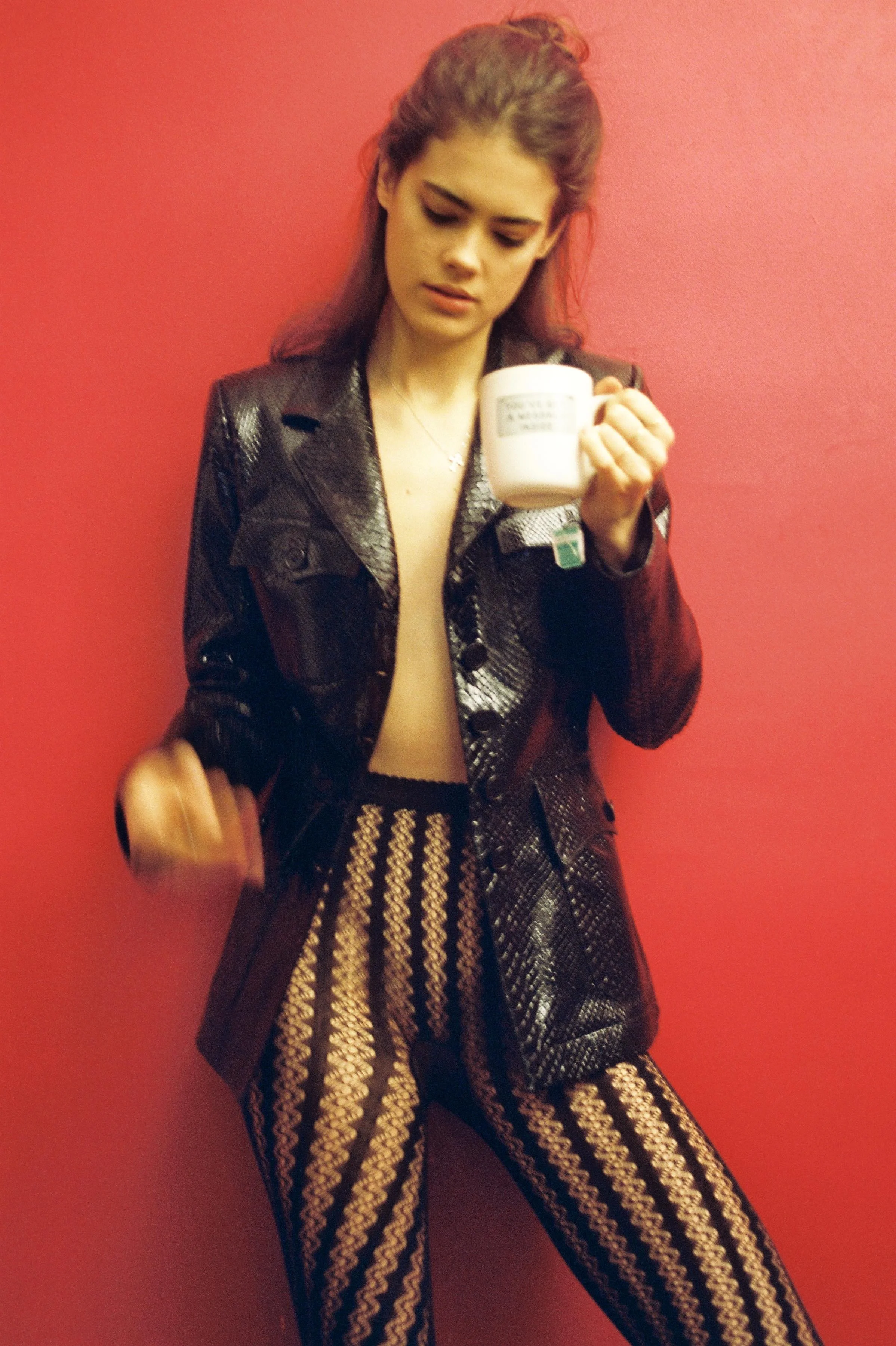 Python jacket ALAÏA, tights WOLFORD, diamond cross necklace and fine silver rings LAURA LEE JEWELLERY.