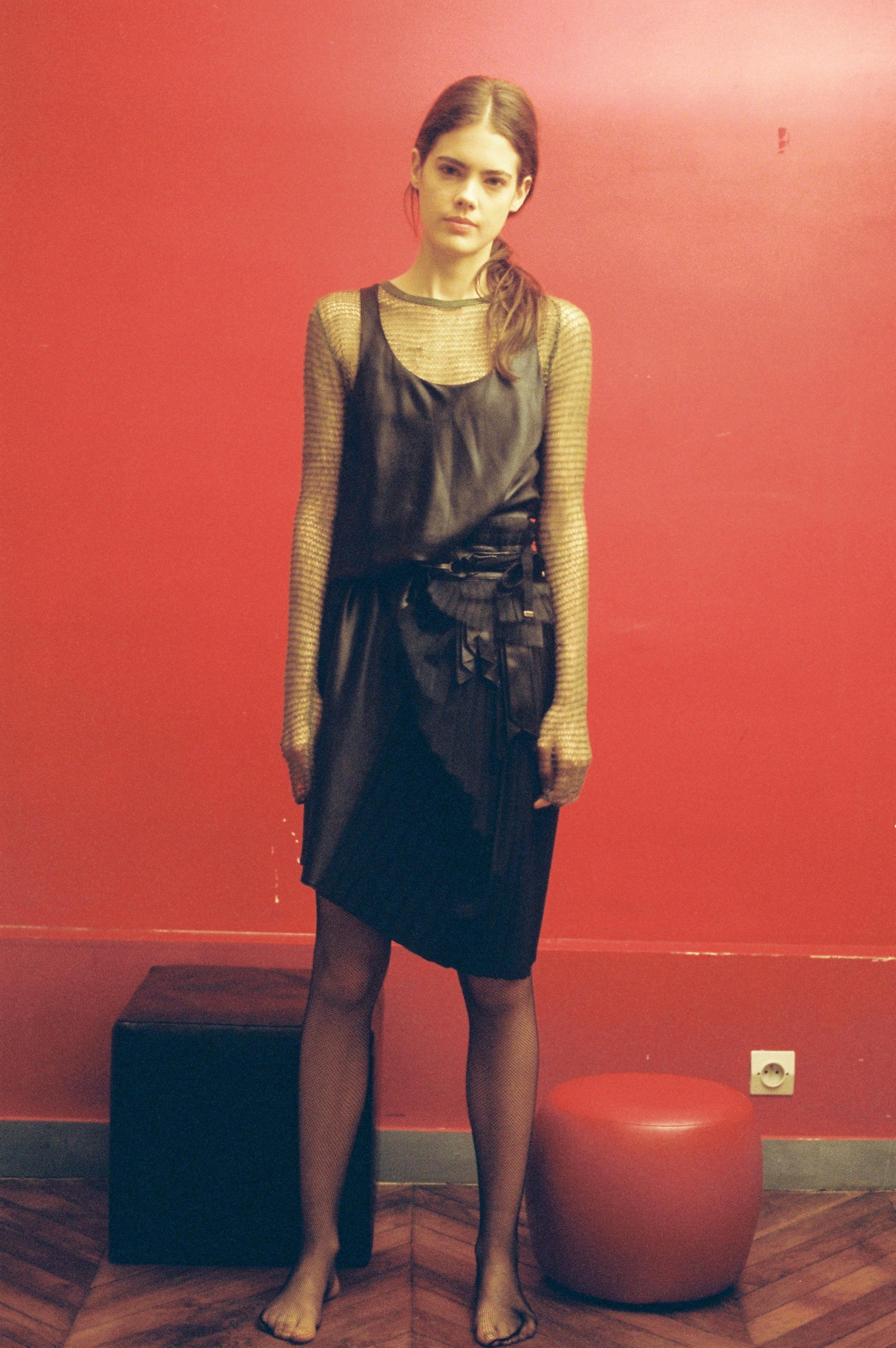  Silk black dress  VERONIQUE BRANQUINHO,  cashmere and silk fishnet top  JEAN COLONNA.  