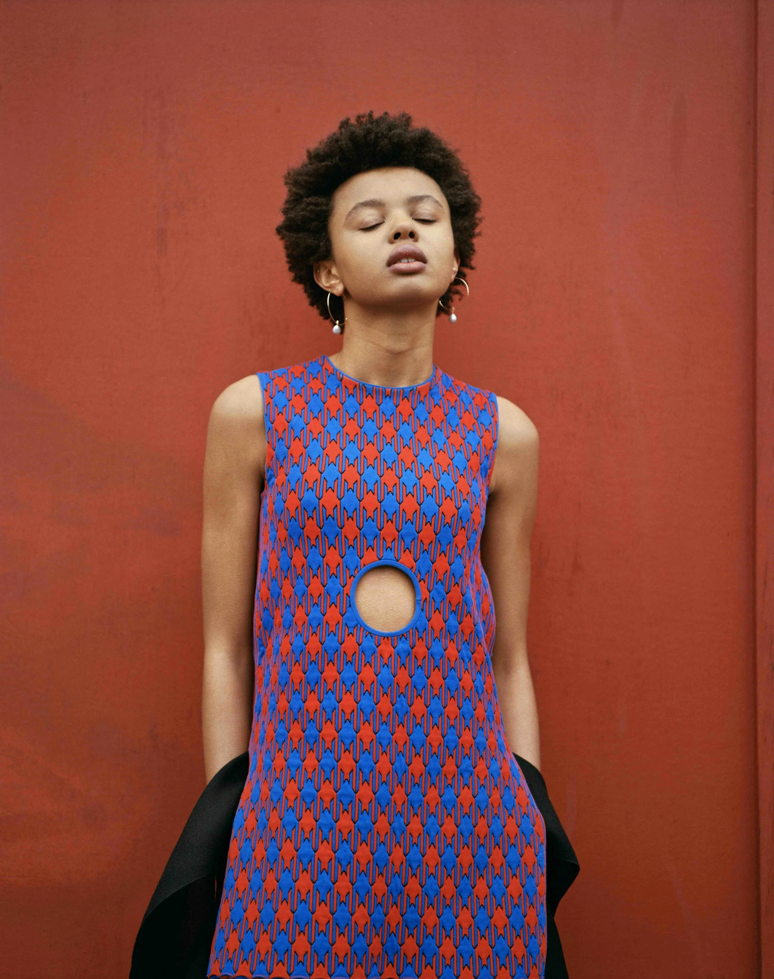 Jacquard knit two toned cut out dress and burgundy lambskin ballerina pumps. Agate horse cameo necklace and fine silver rings LAURA LEE JEWELLERY, pearl hoop earrings and diamond bracelets SWEET PEA JEWELLERY.