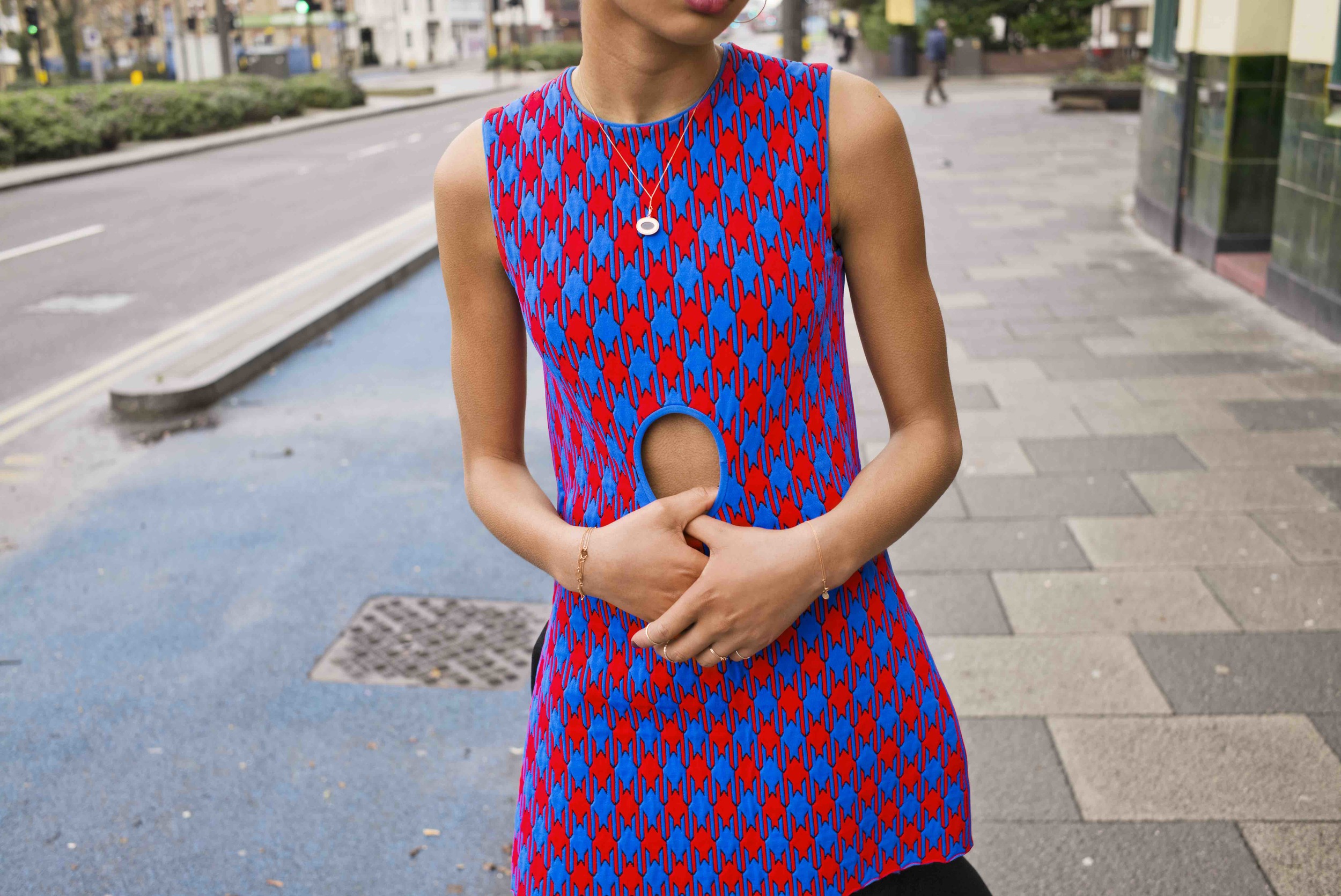  Jacquard knit two toned cut out dress and burgundy lambskin ballerina pumps. Agate horse cameo necklace and fine silver rings  LAURA LEE JEWELLERY,  pearl hoop earrings and diamond bracelets  SWEET PEA JEWELLERY.  