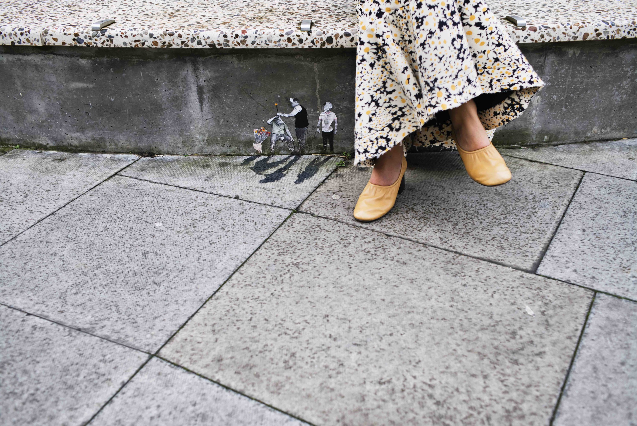  Silk floral printed top and asymmetrical skirt, body hand belt and tan lambskin ballerina pumps. 