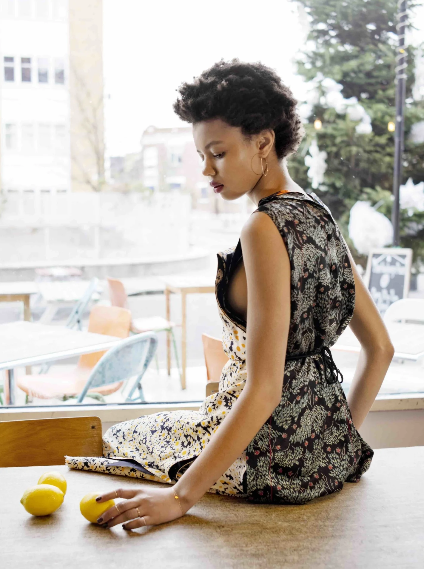 Silk floral printed top and asymmetrical skirt, body hand belt. Rose gold hoop earrings and fine silver rings LAURA LEE JEWELLERY, diamond bracelets SWEET PEA JEWELLERY.