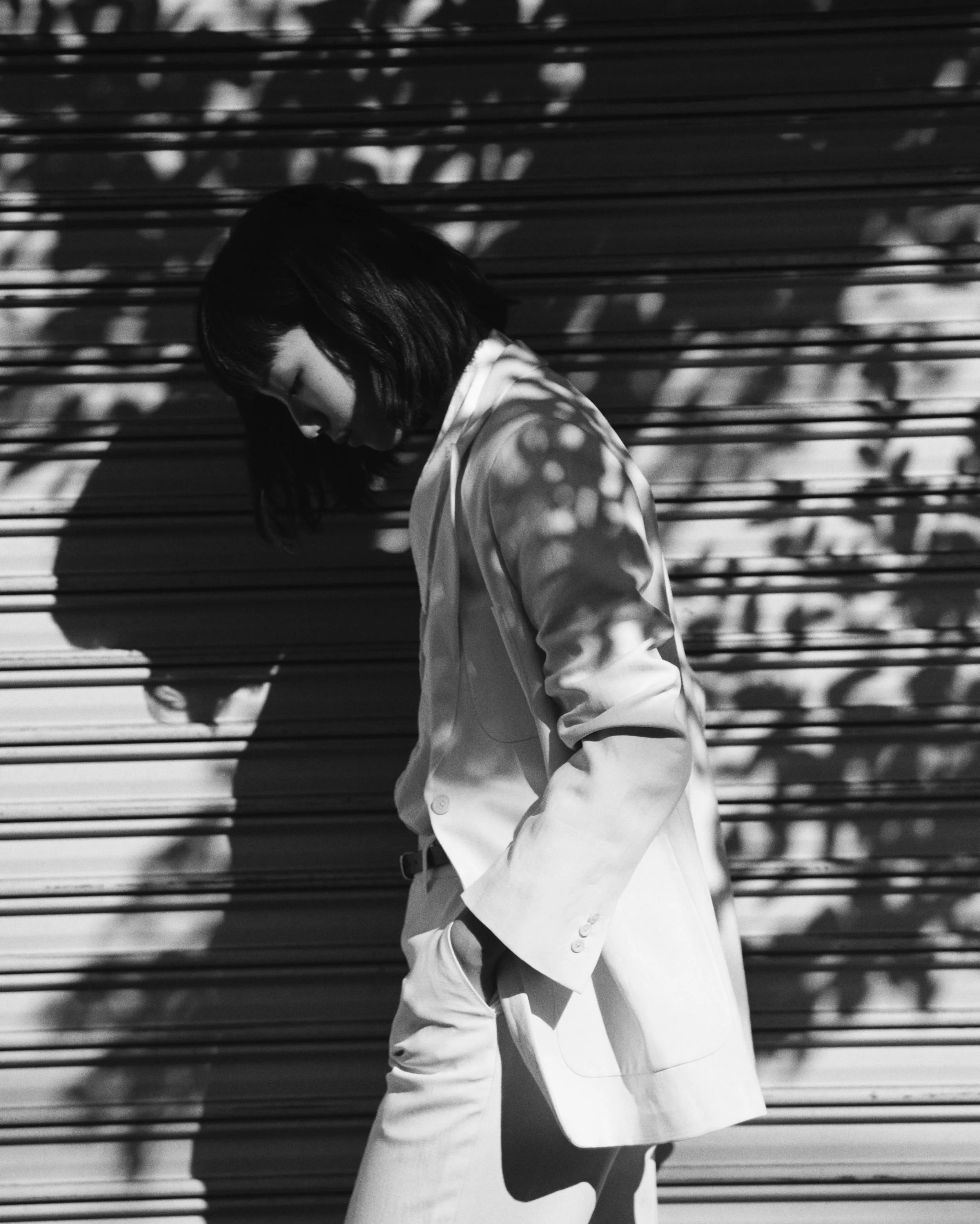 Off white linen jacket and shorts, cotton shirt and black leather belt MARGARET HOWELL.