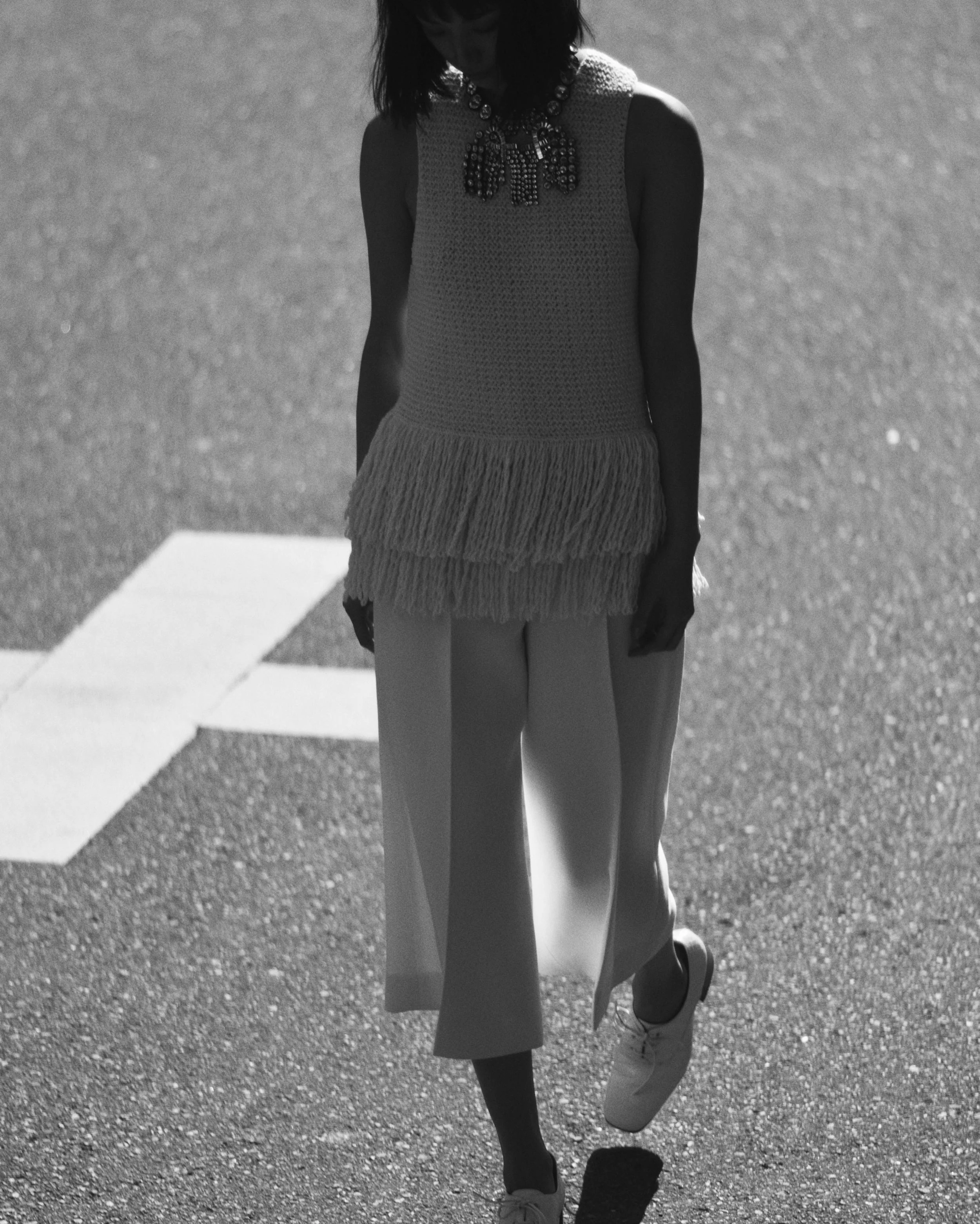 Wool fringed knit top and culottes, brass crystal necklace and stamped crocodile calfskin brogues CÉLINE.