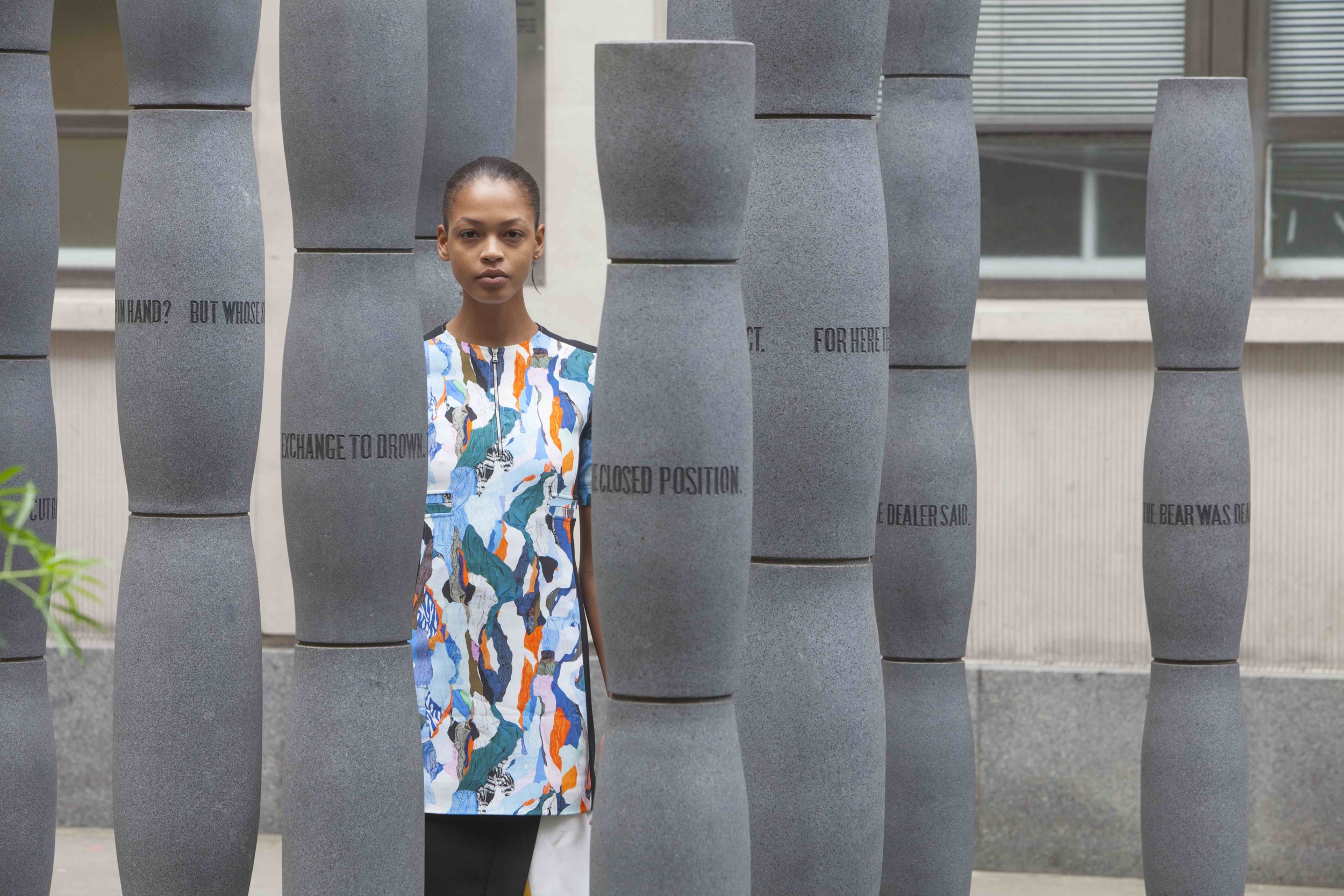  Printed cady dress  CARVEN , silk crepe skirt  FENDI , silver engraved eclipse earring  LAURA LEE JEWELLERY . 