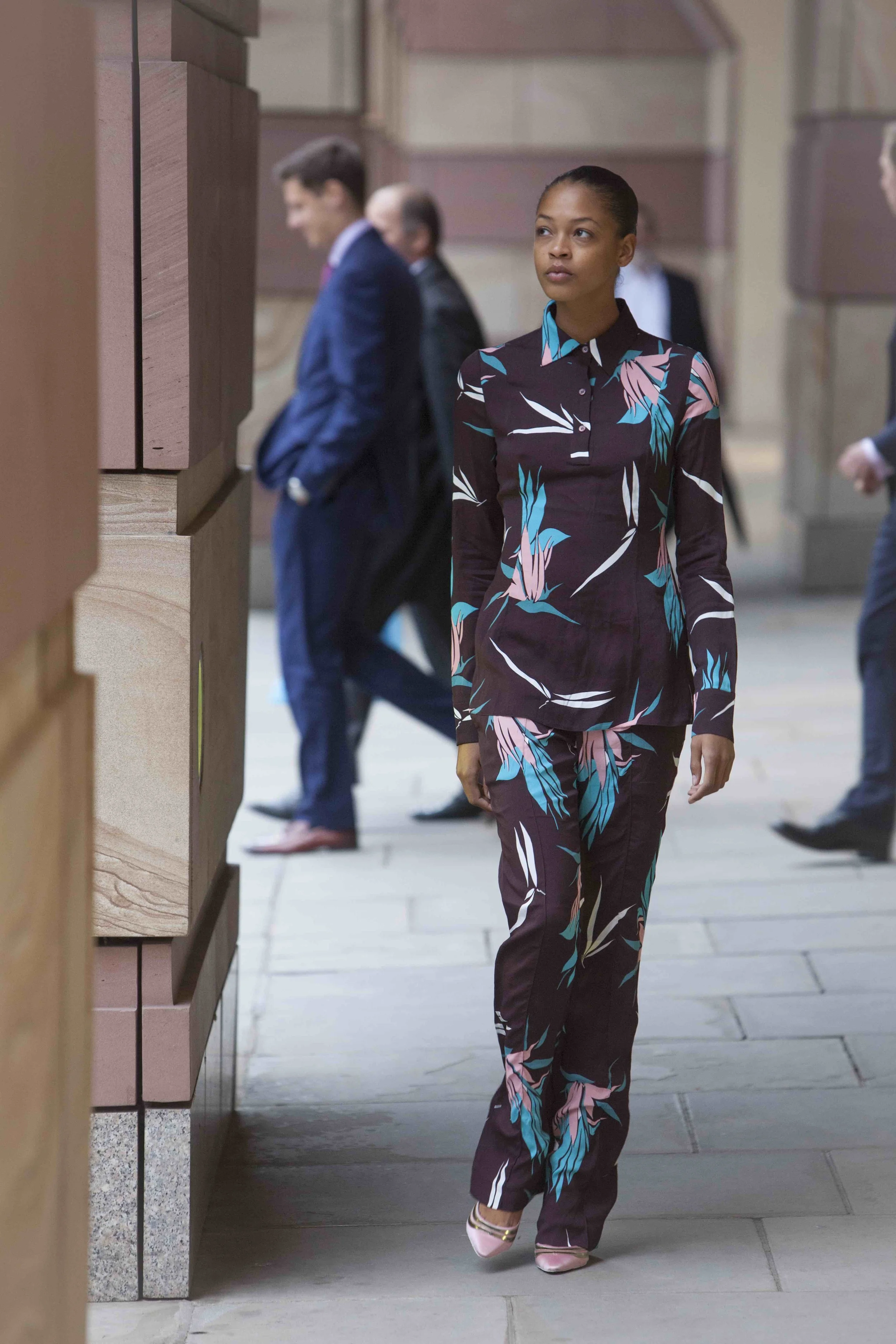Printed top and trousers MARNI , satin pumps LOUIS VUITTON .