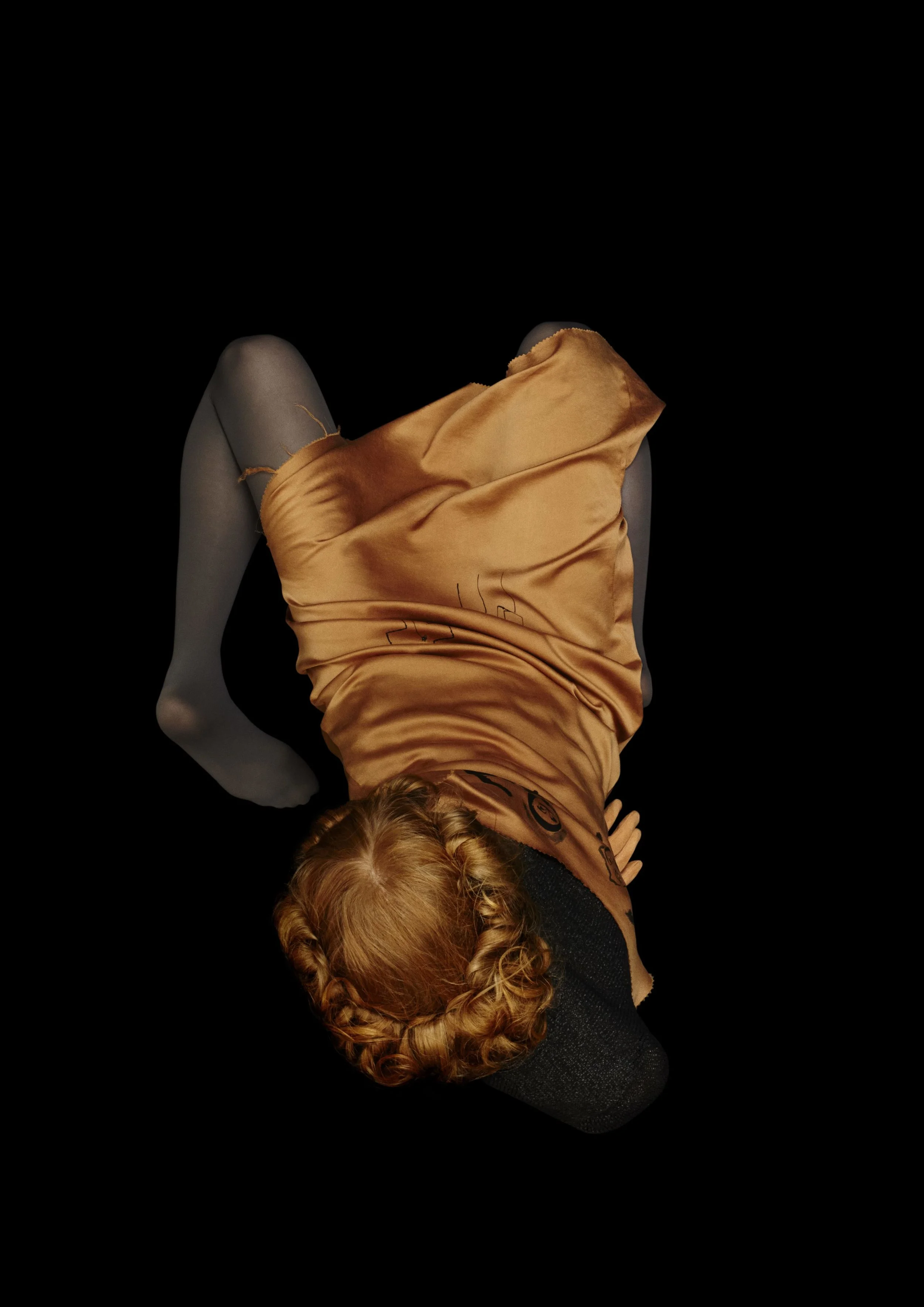 Terracotta silk slip dress CLAIRE BARROW, paper knit sweater MINKI CHENG.