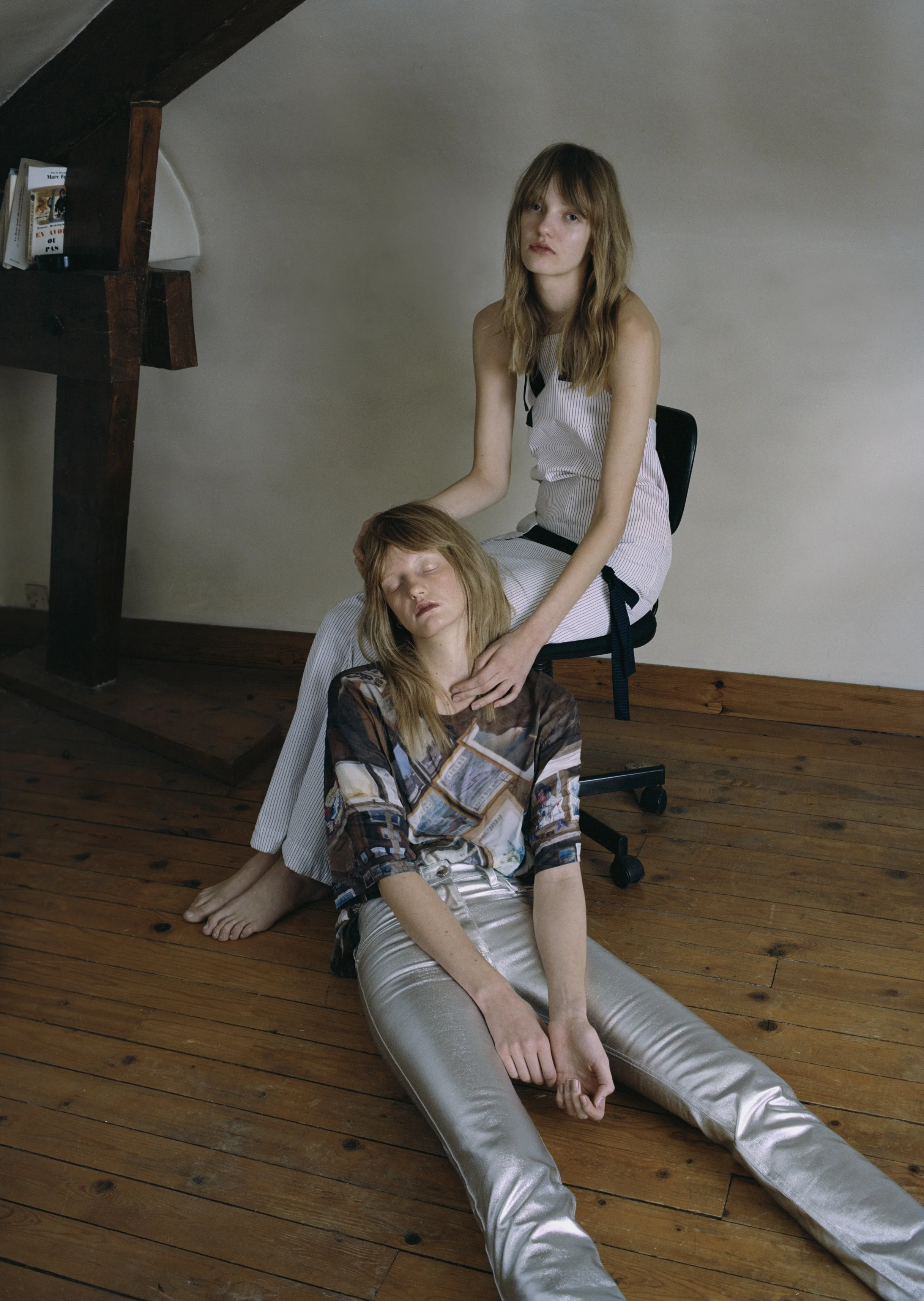 Striped blouse and trousers JACQUEMUS, frame print tee BLESS, silver denim trousers PACO RABANNE.