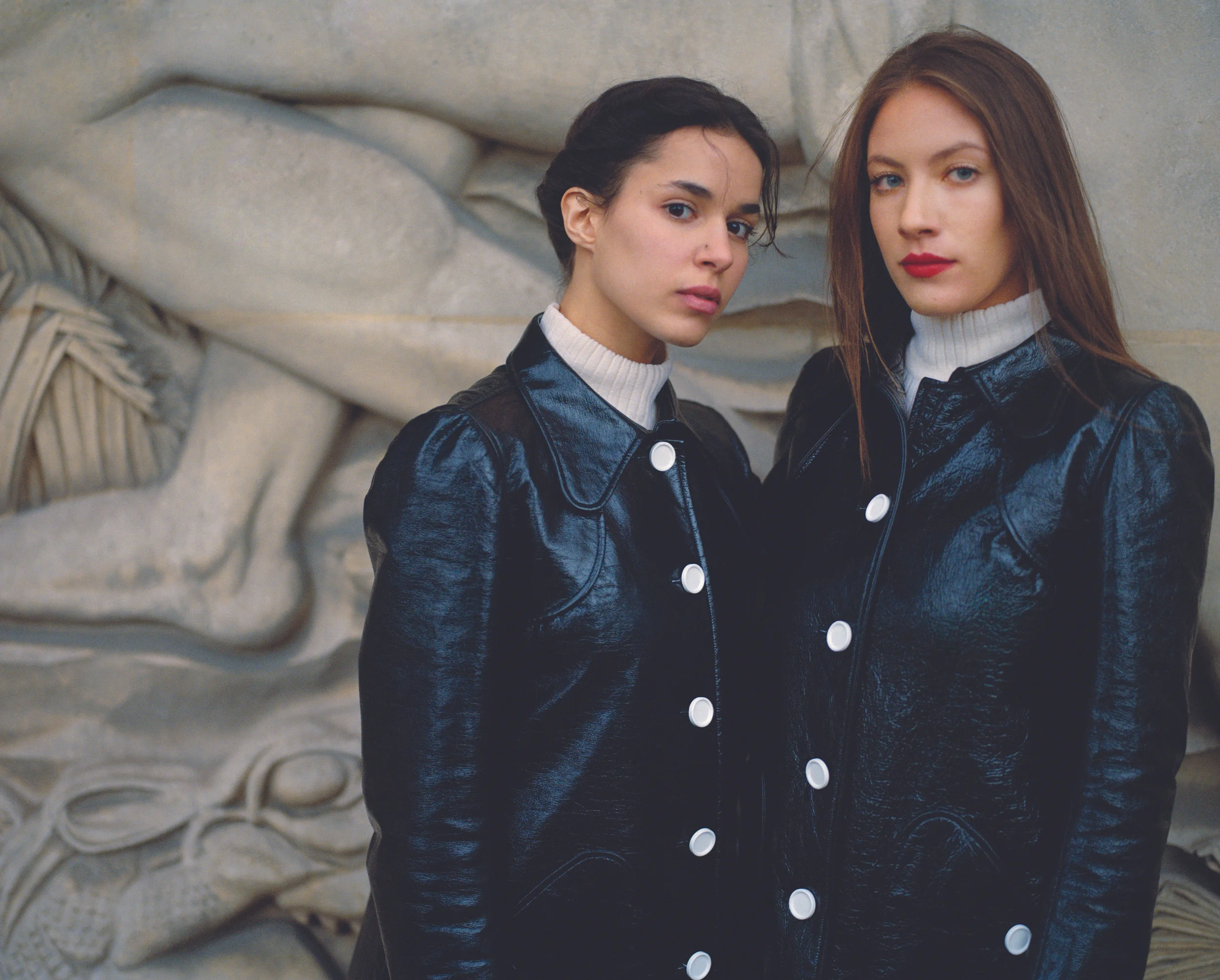 Black lambskin coat and knitted turtleneck COURRÈGES.