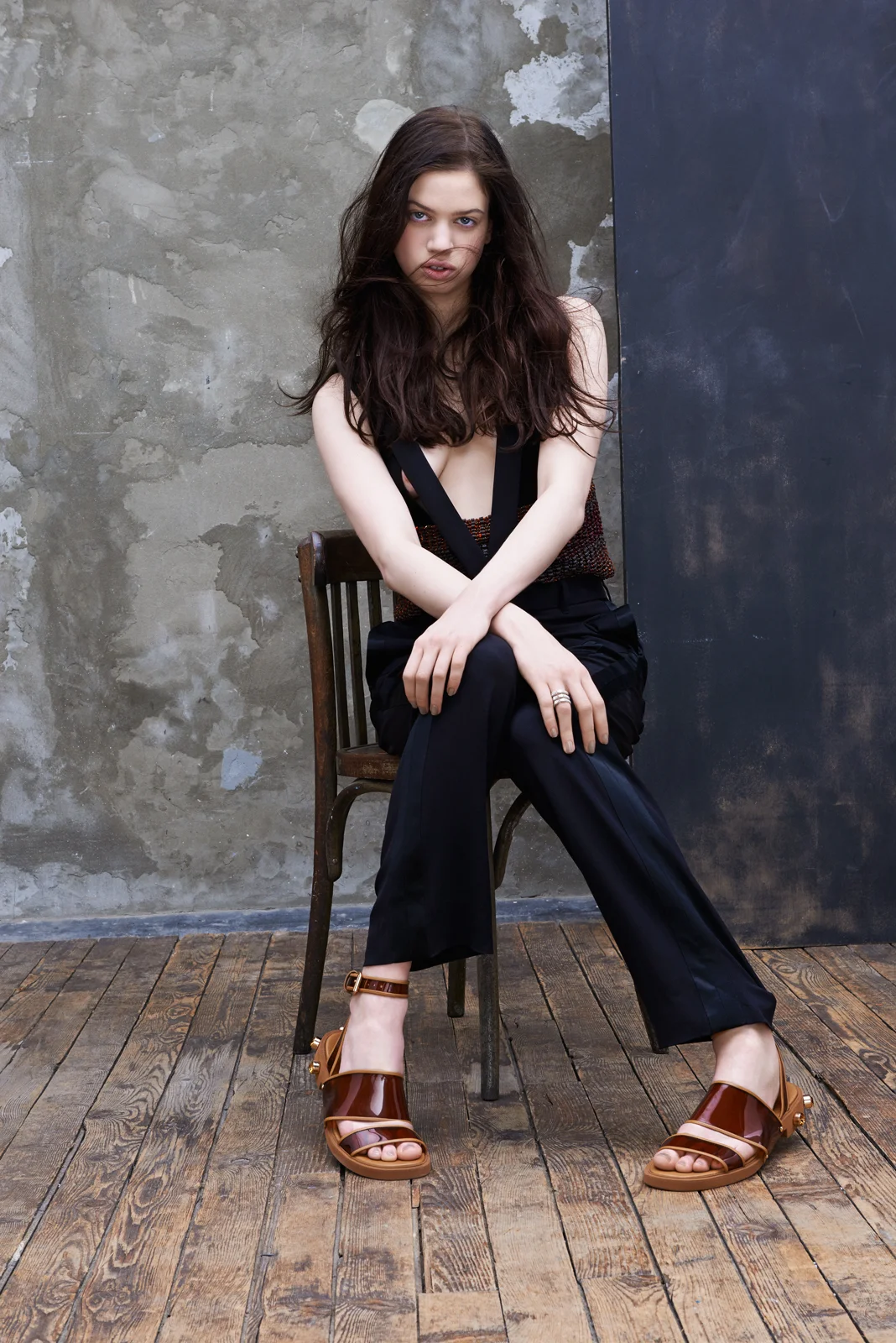 Knit body with copper sequined bustie, moroccon crepe trousers with suspenders and plastic sandals GIVENCHY BY RICARDO TISCI , ophydienne ring in white gold fully set with diamonds REPOSSI .