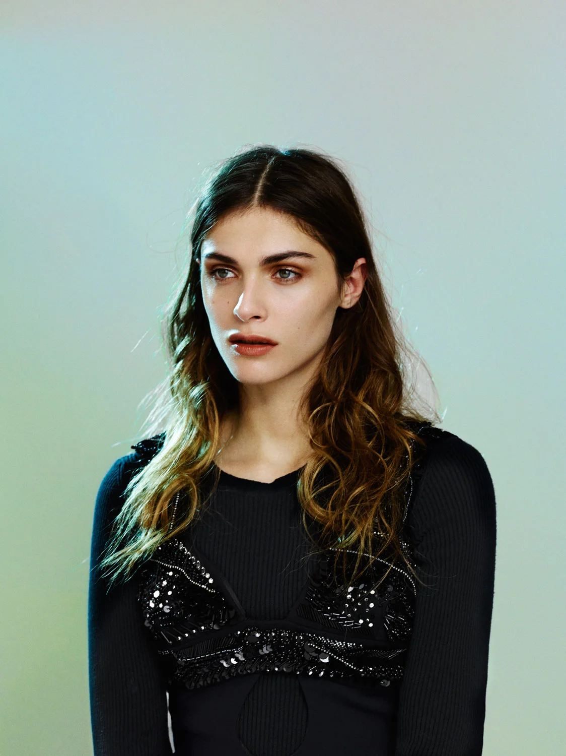 Embroidered black wool dress PRADA , ribbed blue sweater RAF SIMONS spring/summer 2011.