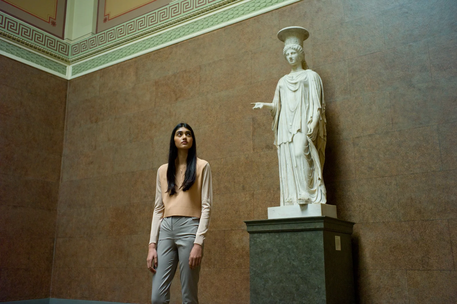 Nude silk sweater SPORTMAX , high-waisted lean trousers EMILIO DE LA MORENA , rose gold chain necklace with pendent and gold weathered rings LAURA LEE JEWELLERY , black leather ankle boots RAG & BONE .