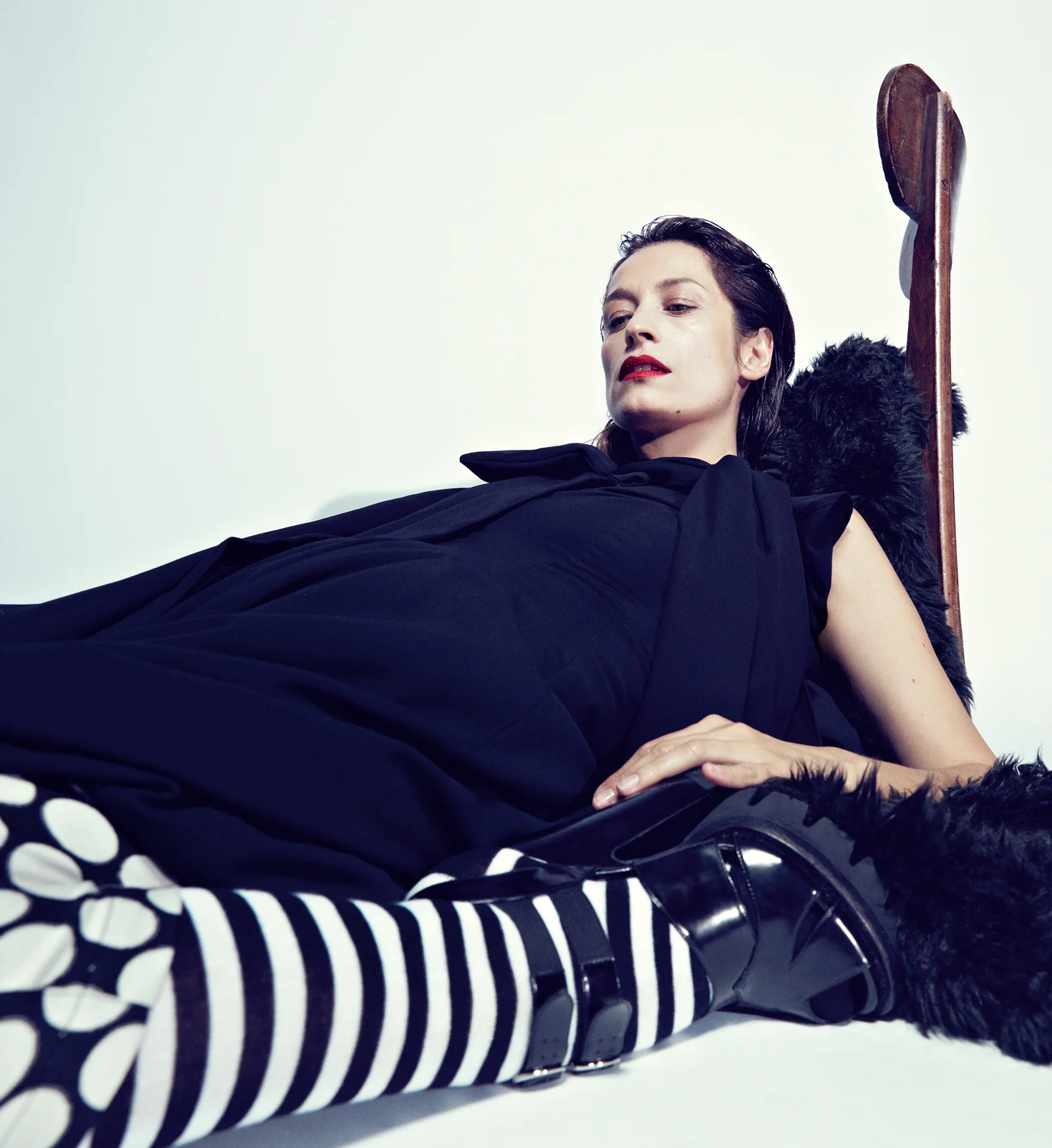 Black wool dress and asymmetrical cape YOHJI YAMAMOTO .