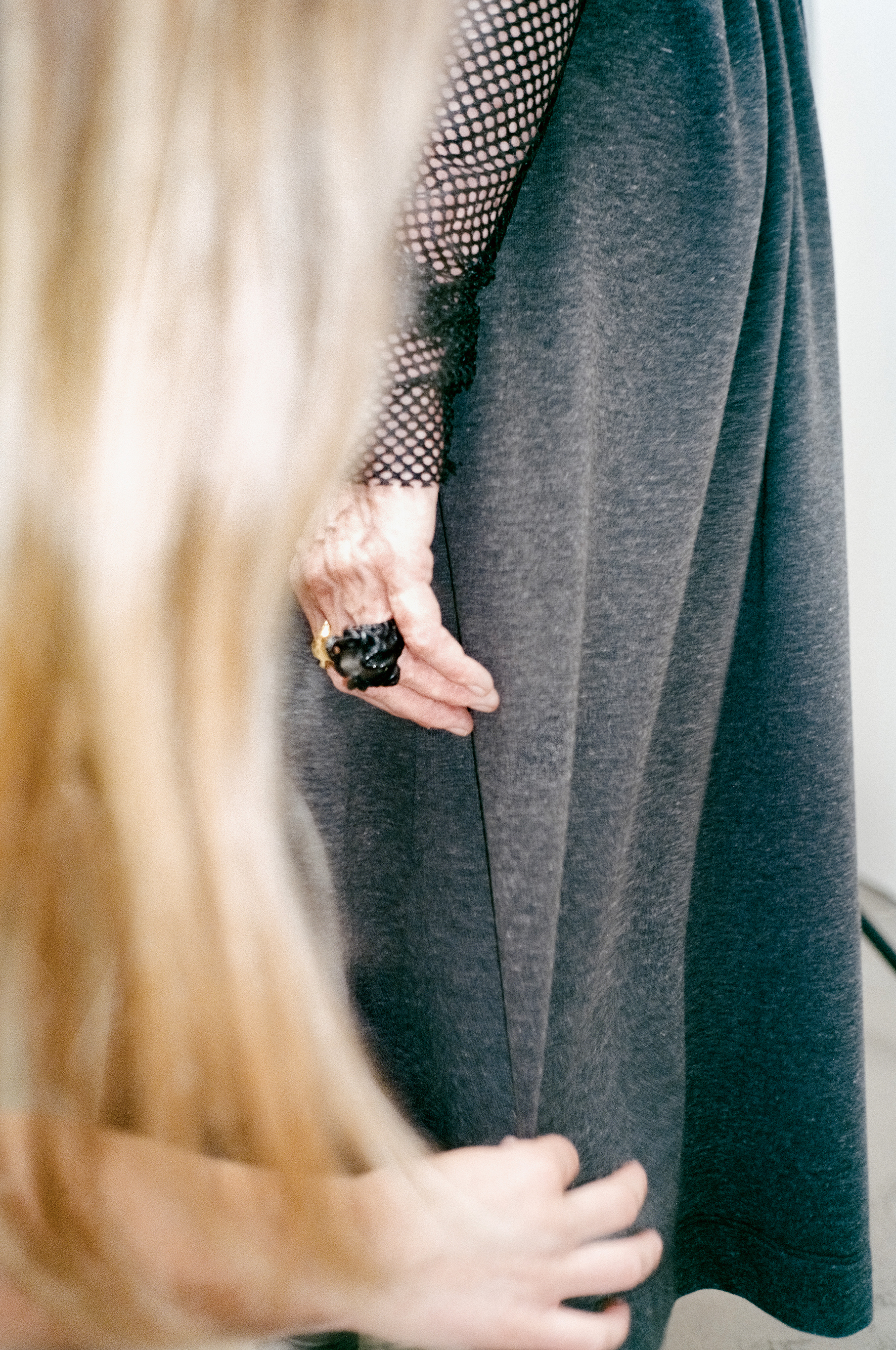  Fishnet turtleneck, grey wool dress, oversize rings. Black tights WOLFORD&nbsp; 
