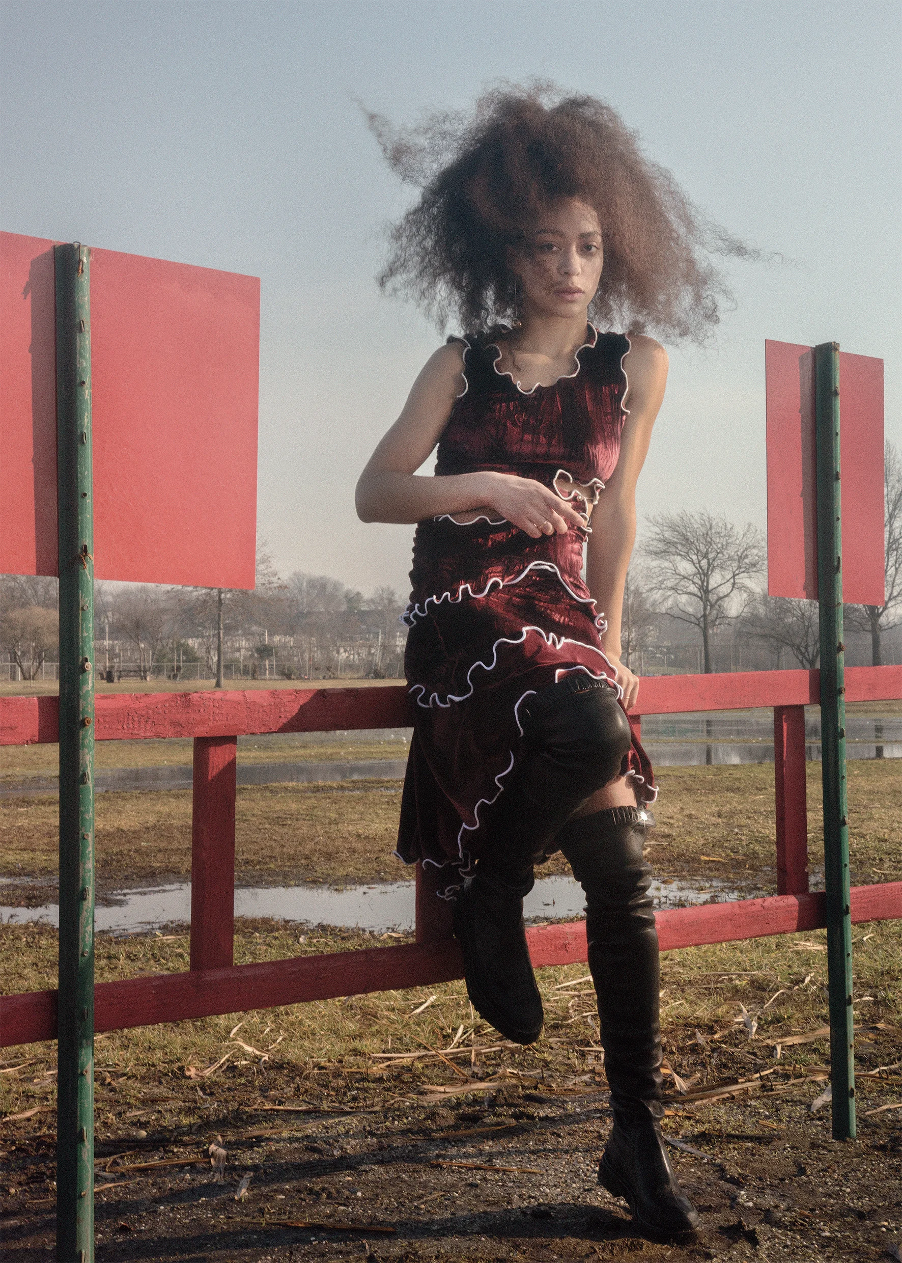 Hepworth drop earring LEIGH MILLER, crunched velvet burgundy top and skirt PEET DULLAERT, leather black country boots CÉLINE. 