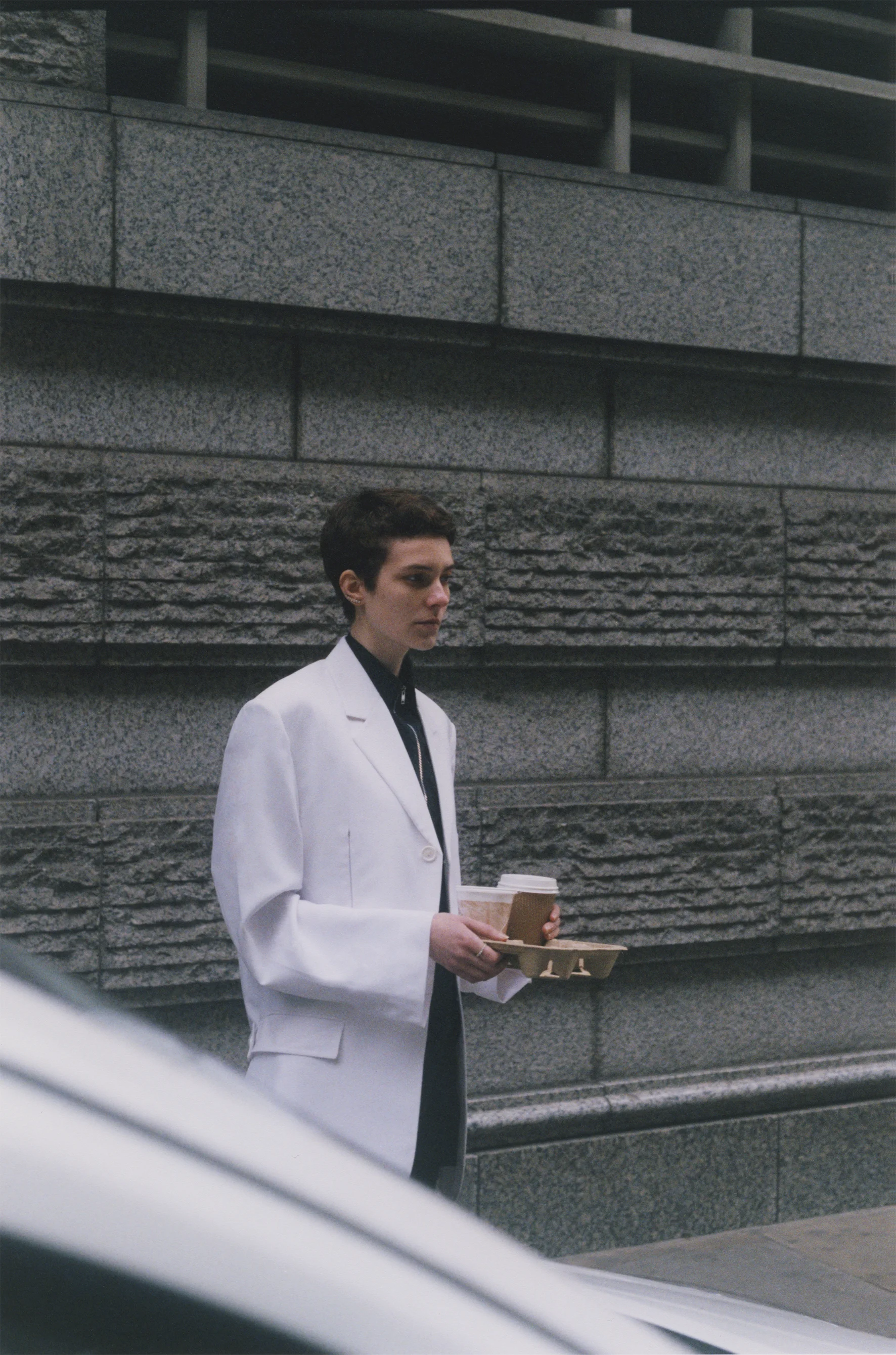 White techno suiting jacket and sleeveless cotton top CÉLINE.