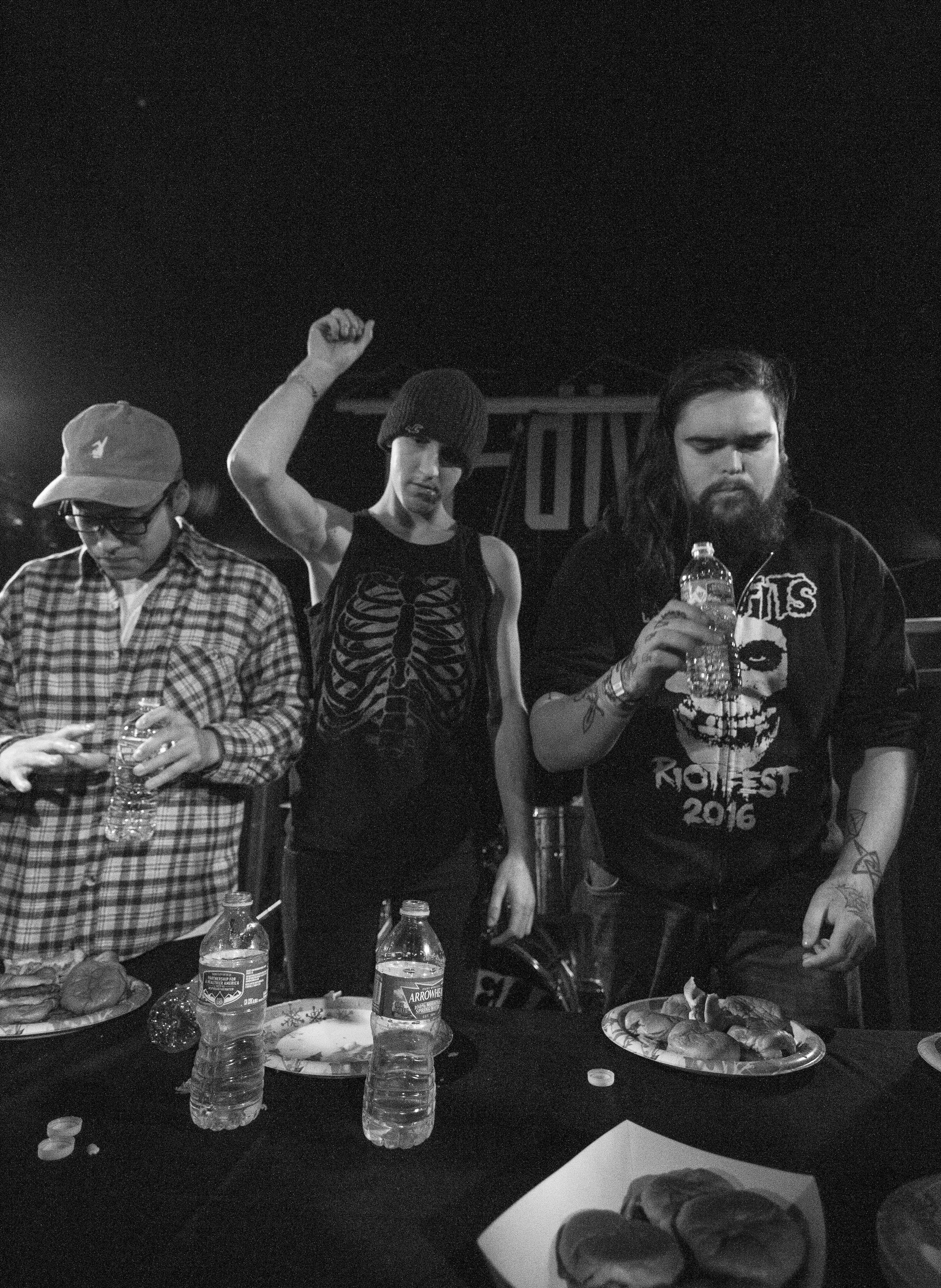 Burger champ, Andrew Renfrow, center