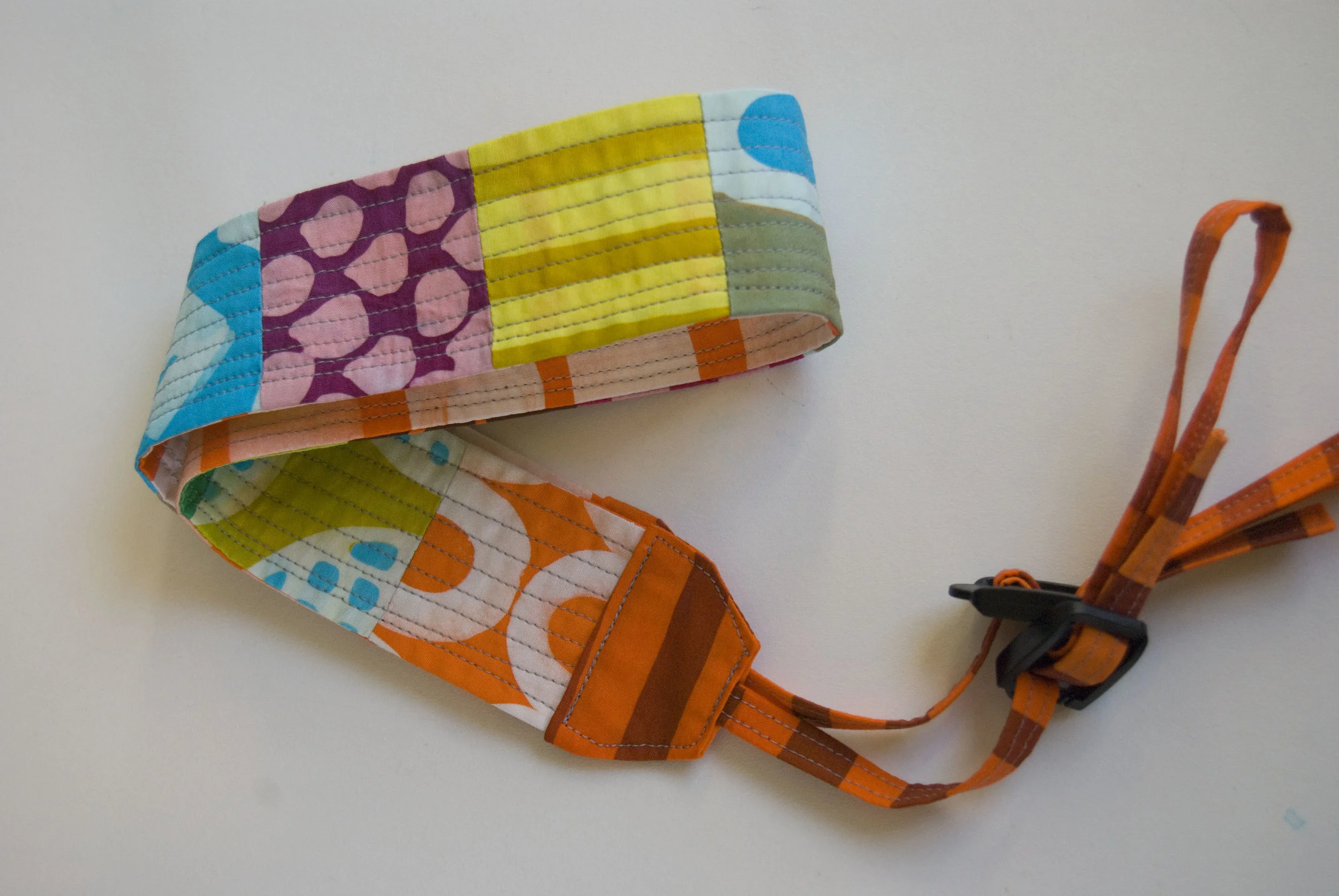 yip-365195--patches-camera-strap_4421488870_o.jpg