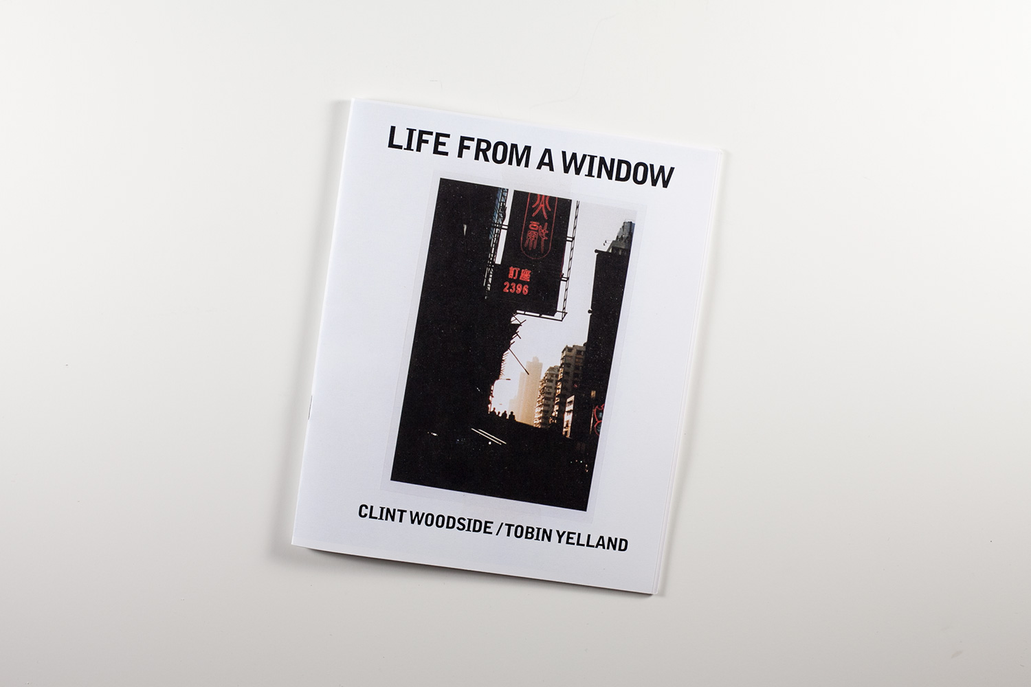   Clint Woodside / Tobin Yelland - &nbsp;Life From A Window  &nbsp; 40 pg. full color photo zine.  Color Laser Print 2 4" x 6" Prints included 8.5” x 7”&nbsp;  Edition of 100 Out of print   Clint Woodside &amp; Tobin Yelland's travel log in Asia.  