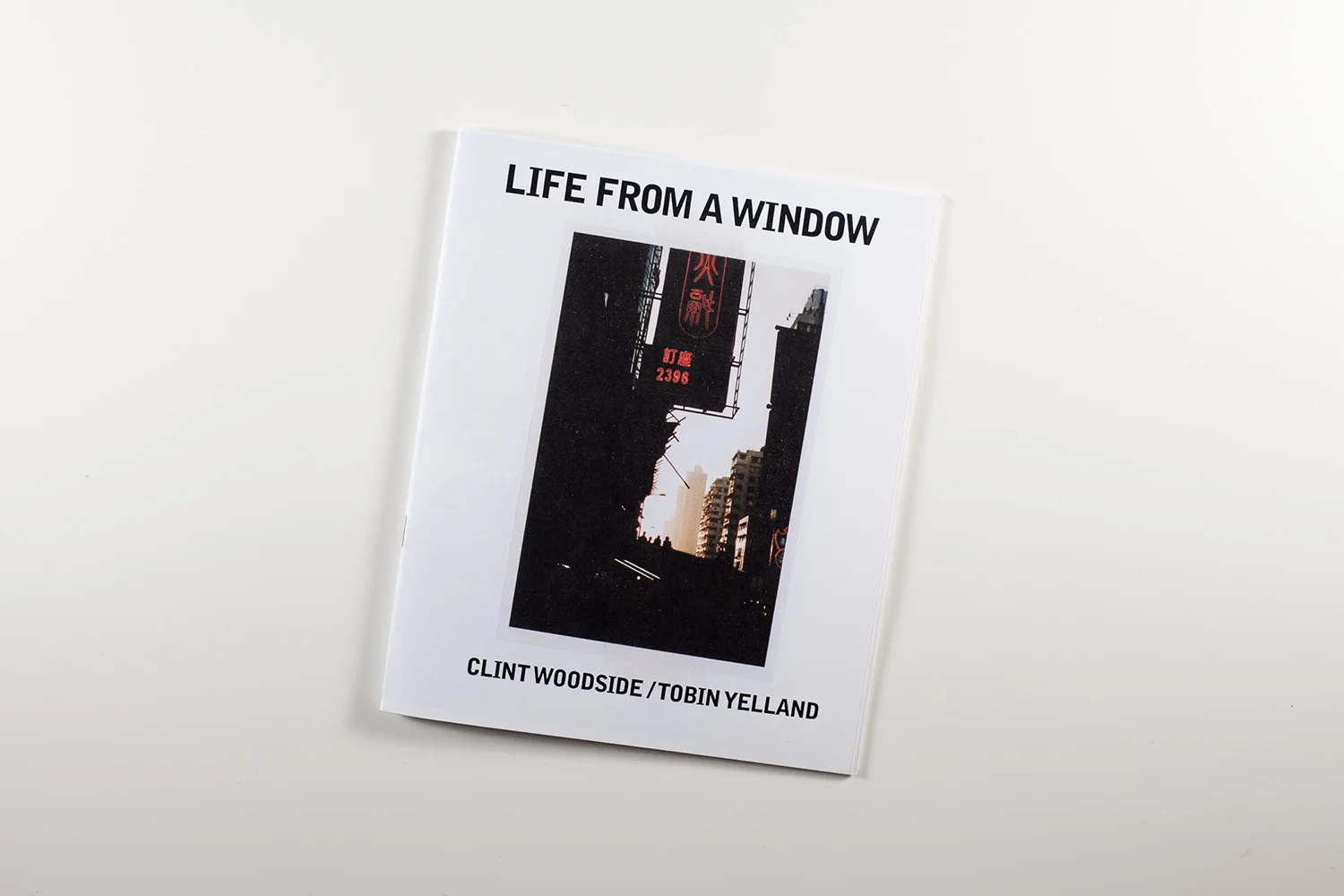 Clint Woodside / Tobin Yelland - Life From A Window 40 pg. full color photo zine. Color Laser Print 2 4" x 6" Prints included 8.5” x 7” Edition of 100 Out of print Clint Woodside & Tobin Yelland's travel log in Asia.