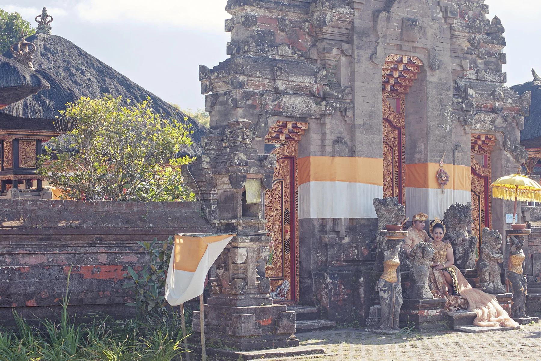 A bride and groom at Ulun Danu Beratan Temple, Bali