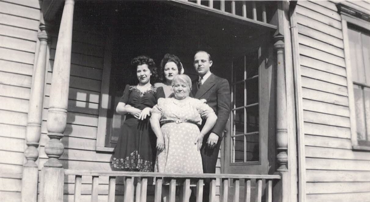  The Americanized "Frank" Family, of Italian heritage, standing proudly on the front porch of their Erskine street home, ca. 1950 