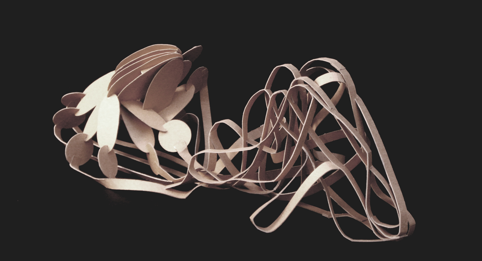 Conceptual model of the connection between the real and the virtual realms, shaped basswood model
