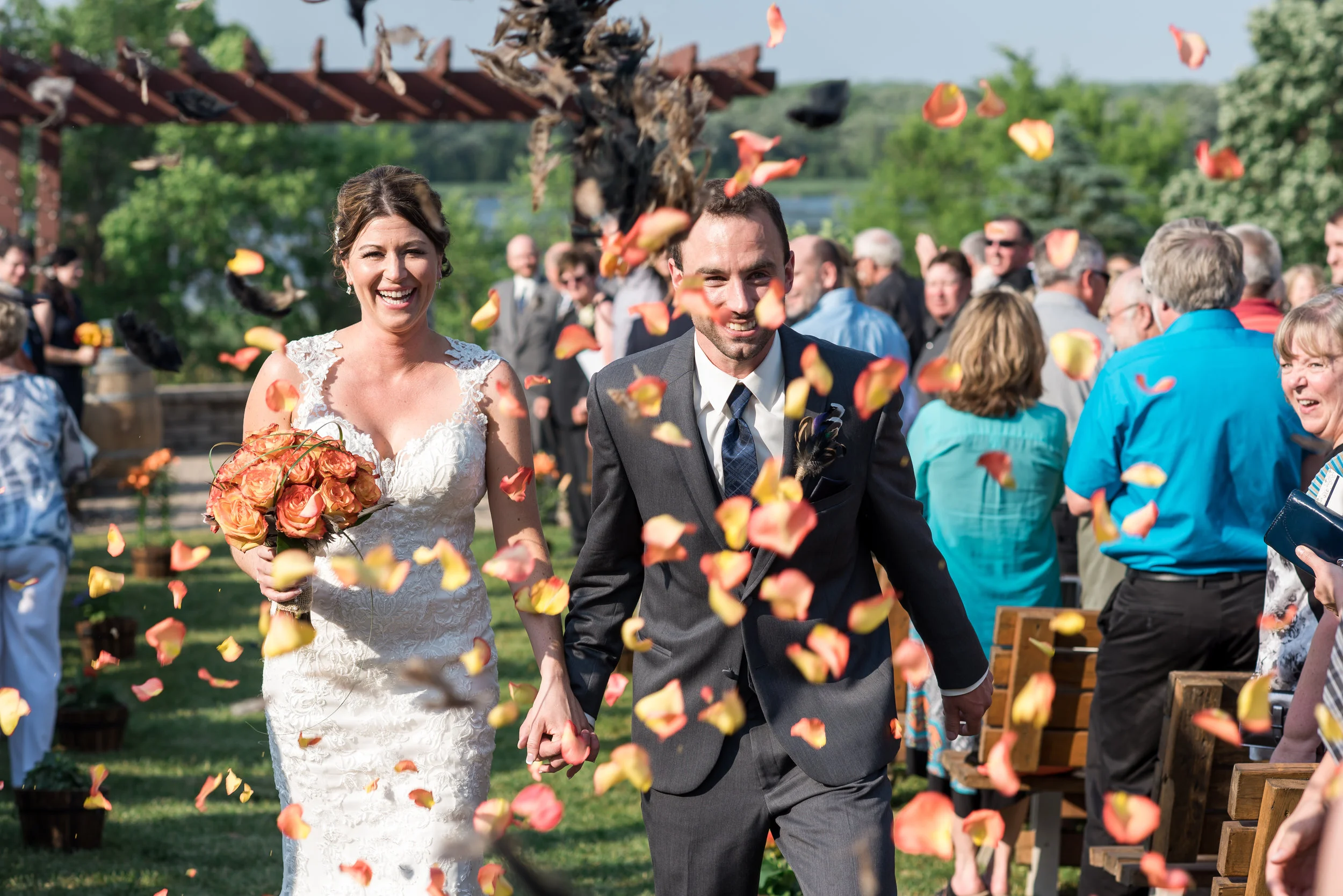 petals and duck feathers confetti recessional walk | Kelly Birch Photography :: Horse and Hunt Club :: Sixpence Events Minnesota wedding planner .jpg