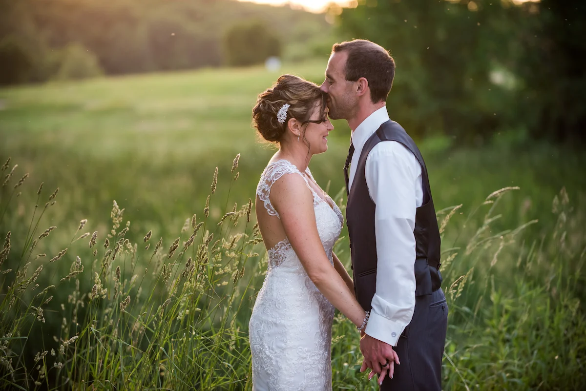 golden hour field photo with the mosquitos | Kelly Birch Photography :: Horse and Hunt Club :: Sixpence Events Minnesota wedding planner .jpg