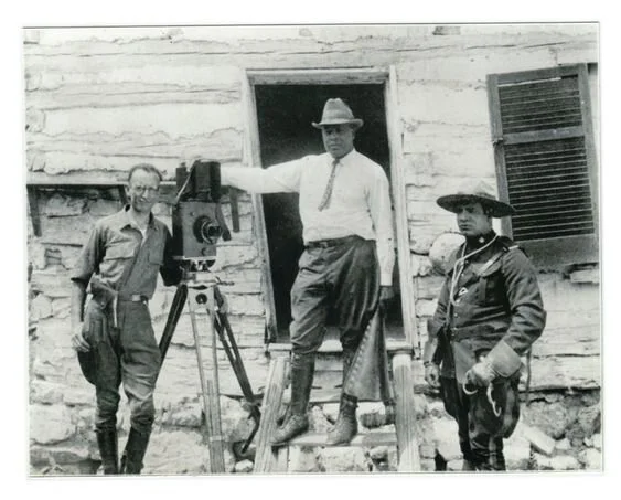Oscar Micheaux with members of his crew on a film set