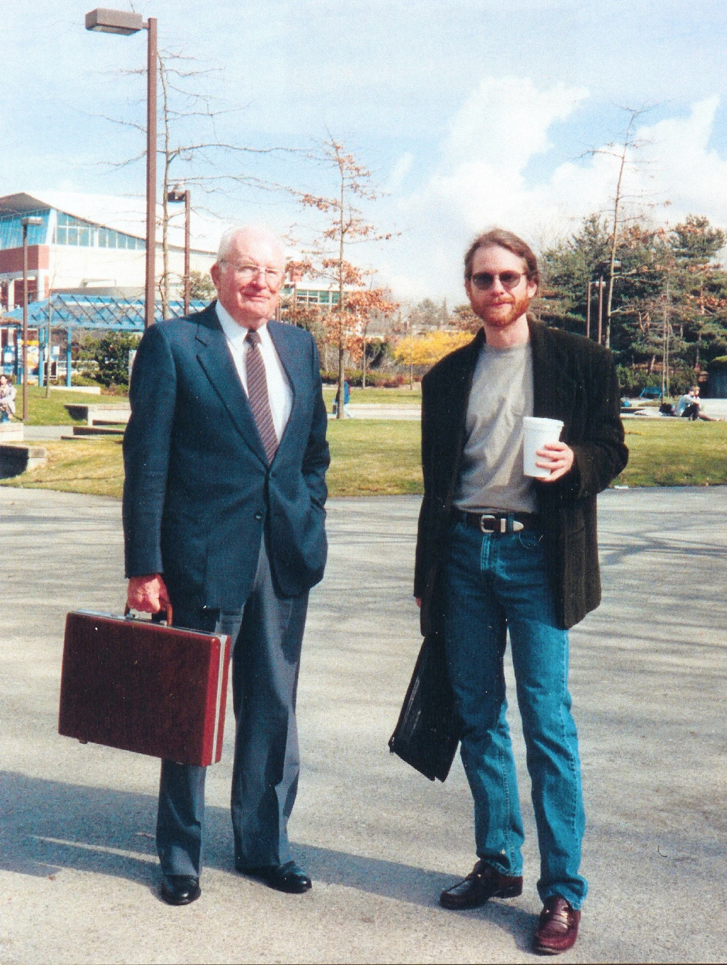 With my dad on the day of my thesis defence. It helps to bring a lawyer ...