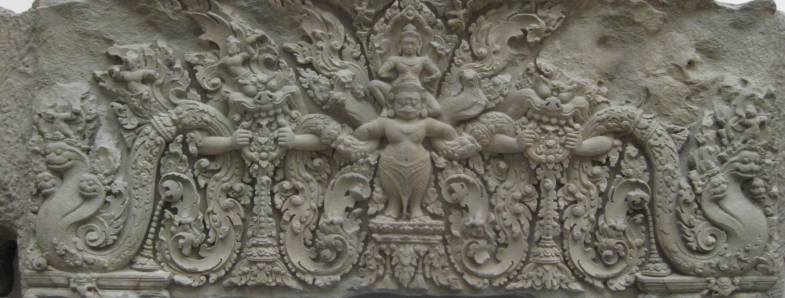 Vishnu on his mount Garuda, flanked by monsters, from Angkor, 9th C. (Guimet Museum, photo RYC)