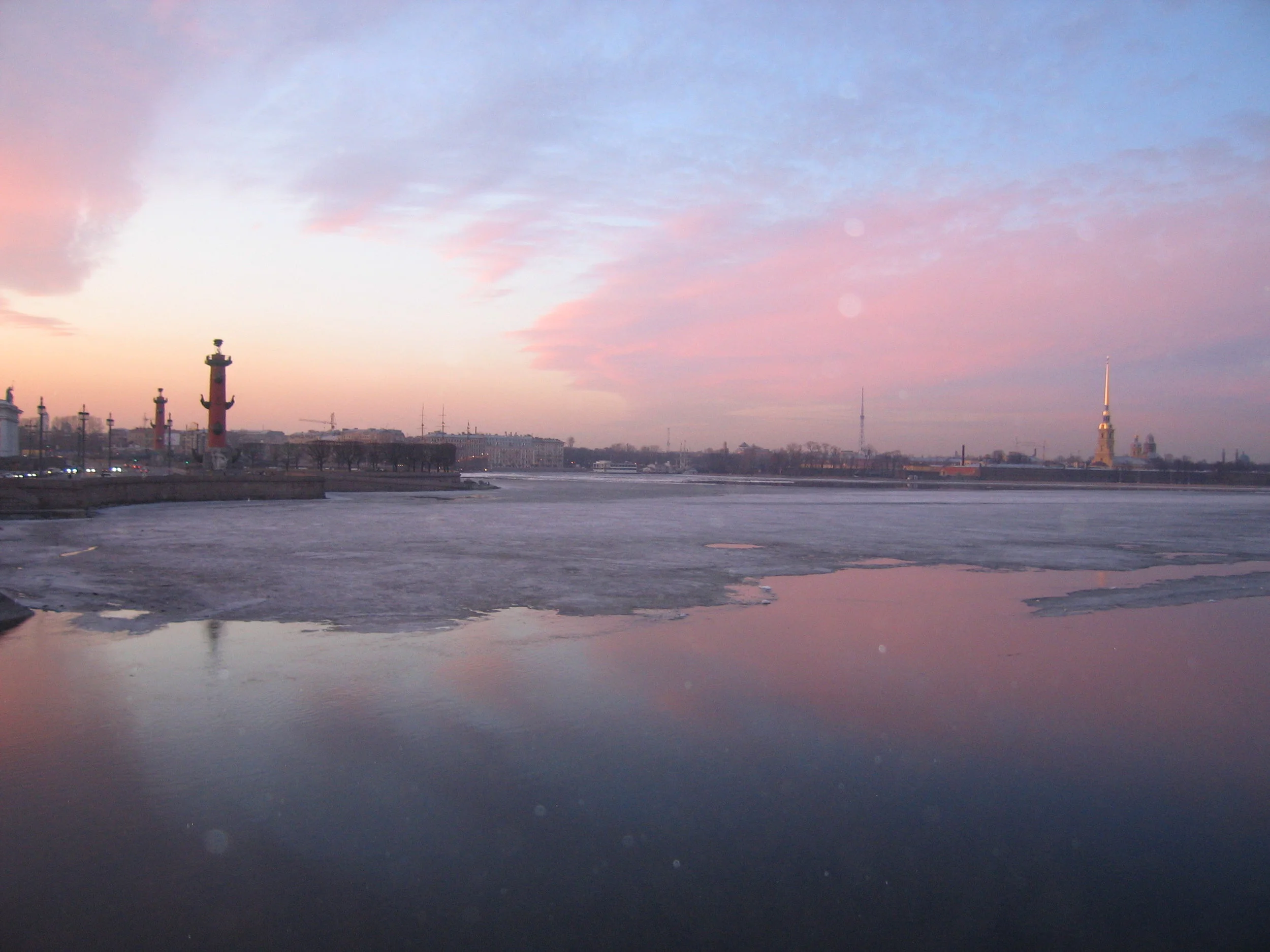 The Neva River runs through St.Petersburg. The April weather is turning the surface ice into water.