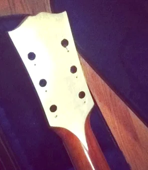 12k white gold oil gilded guitar detailing for Sharon Jones/Amy Winehouse guitar player Binky Griptite, NYC