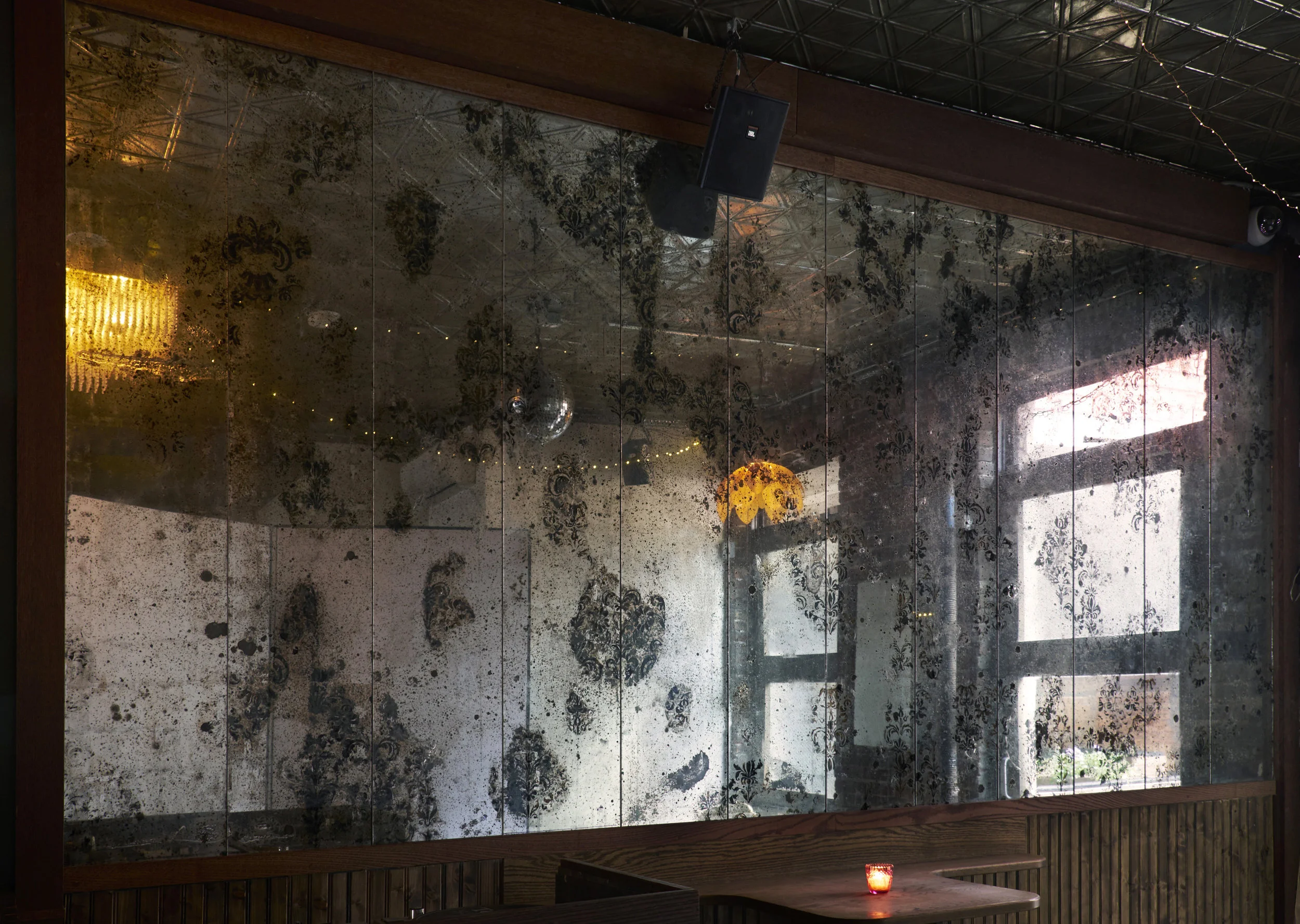 antiqued and etched silver leaf on glass; Broken Land Bar, Brooklyn