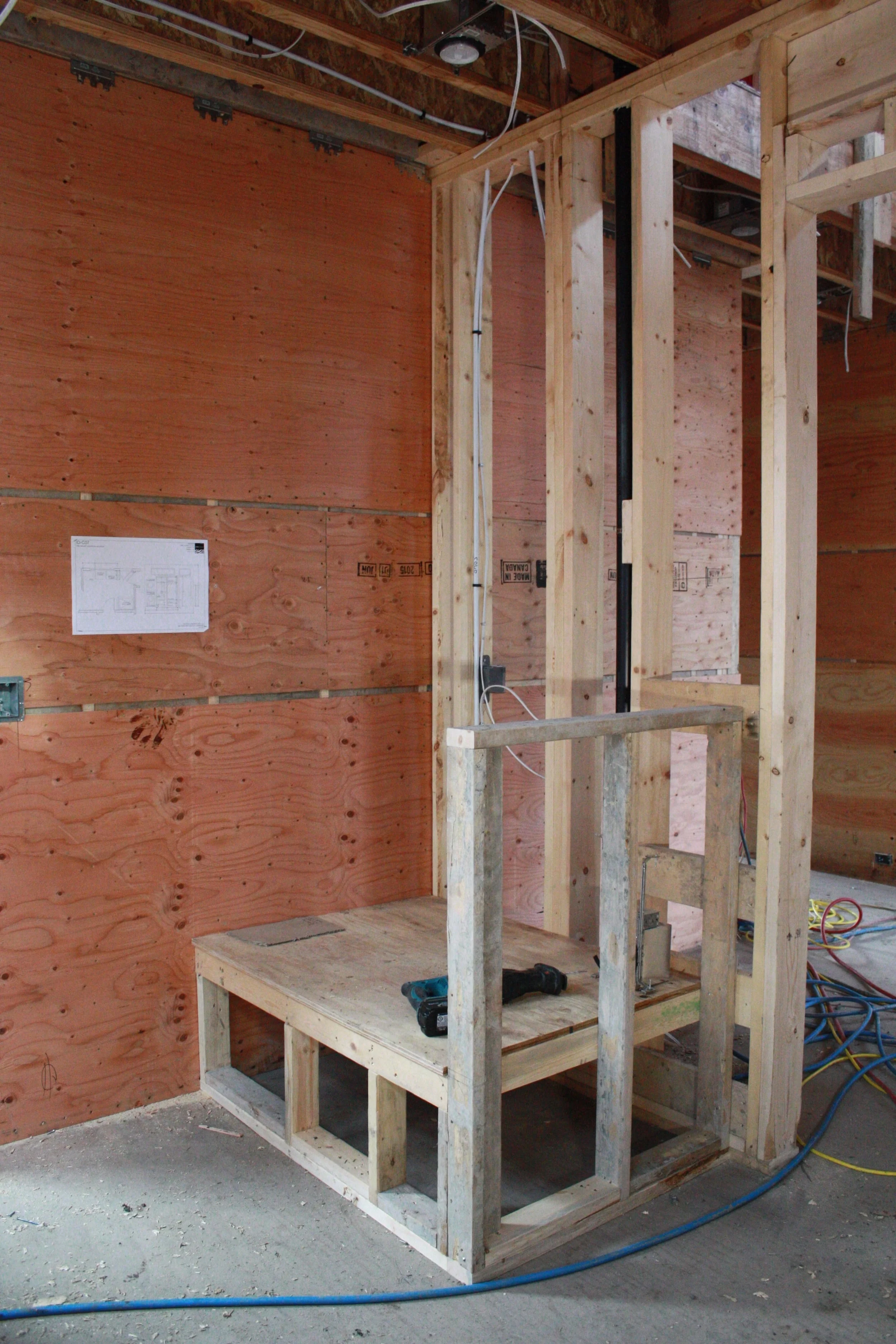 Dog wash/utility shower in the mud room - the other side of the wall is the front entrance. 
