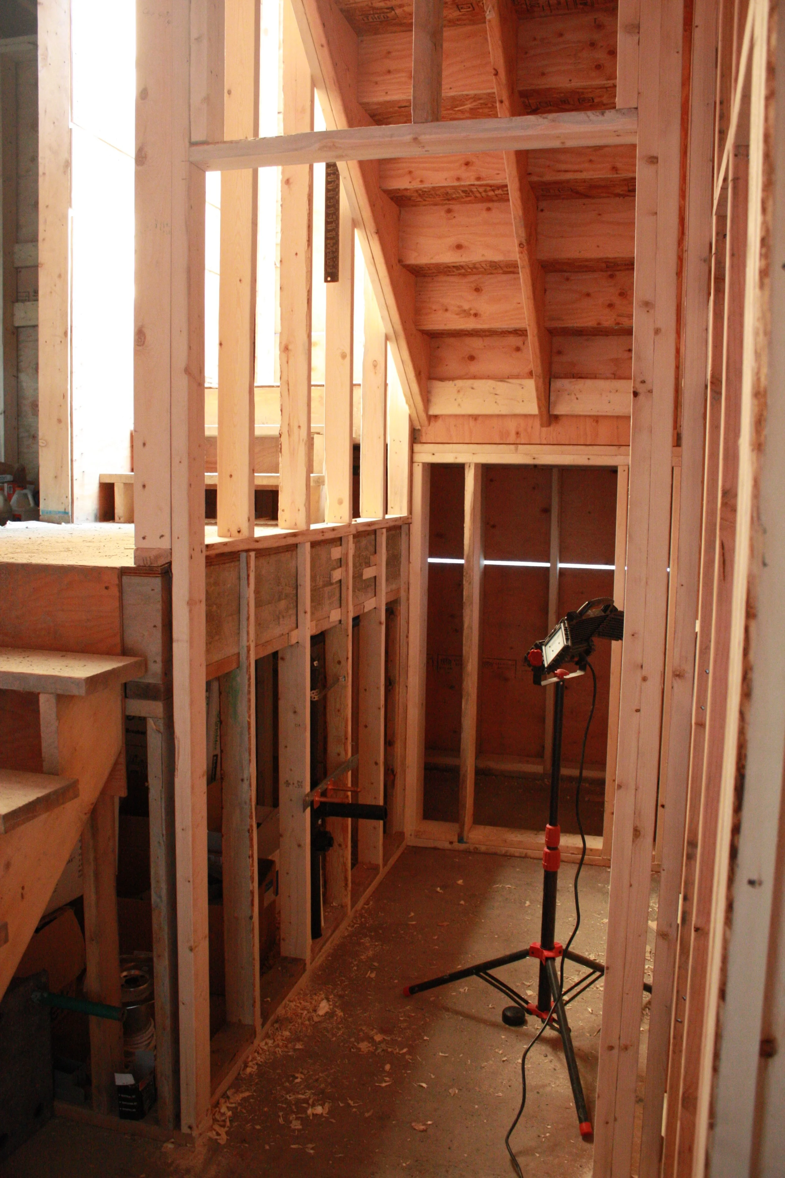 Roughing out the two piece bathroom under the back stairs. 