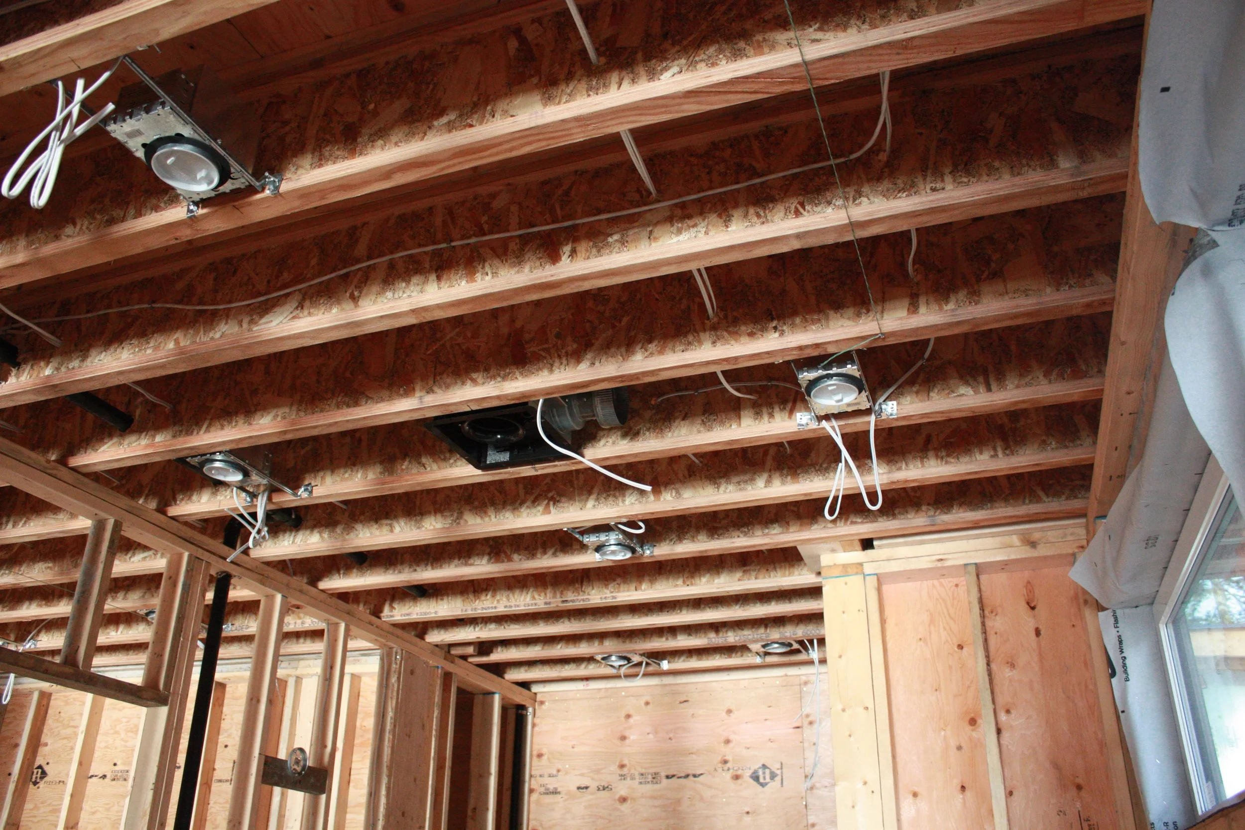 Lighting and fan rough-in in the ensuite bathroom