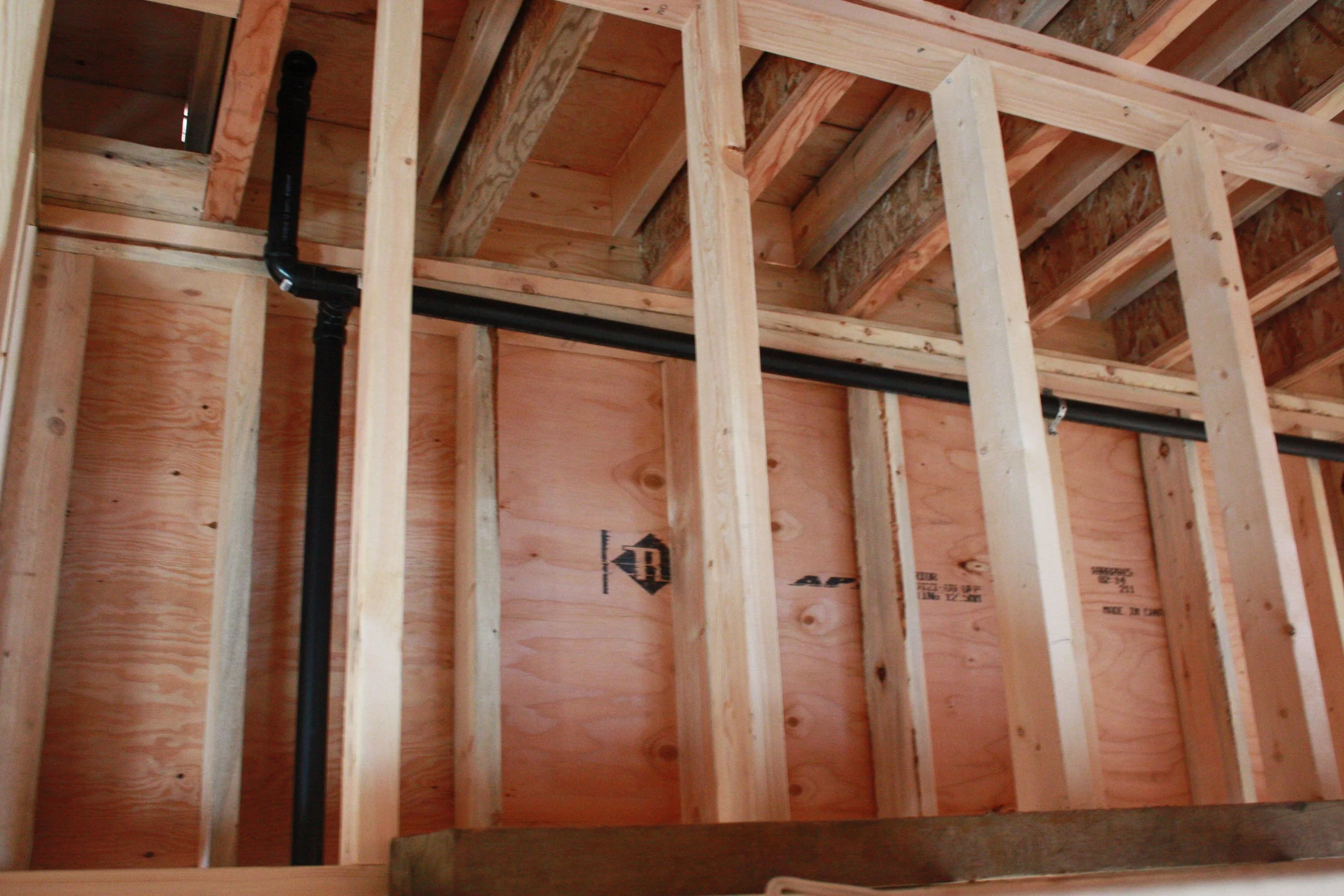 Plumbing pipes that vent to the roof.