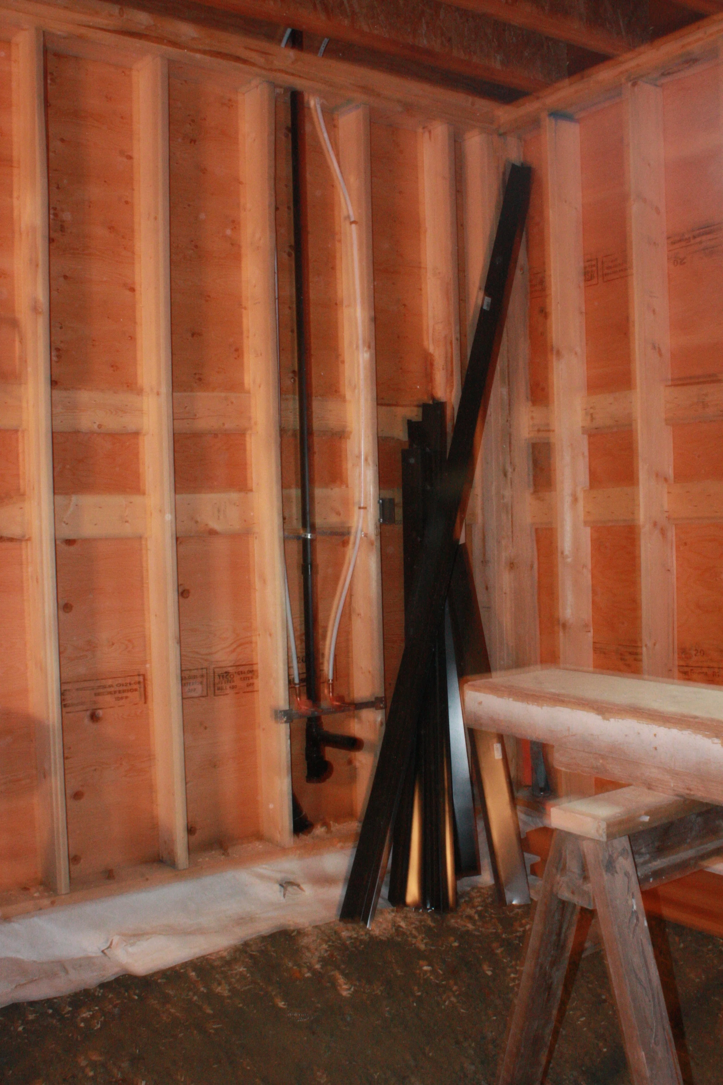 Plumbing rough-in for the sink in the workshop (garage).