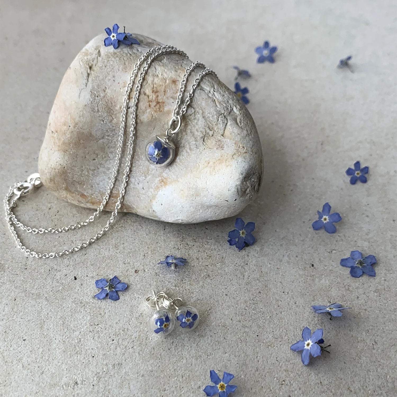Lizzy Chambers Forget me not necklace earrings sq.jpg