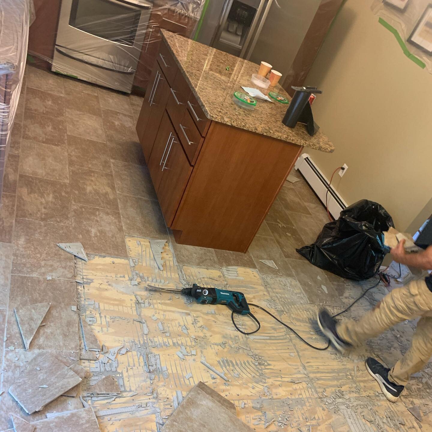 Another one for the books . Hallway , stairs and living room had carpet that&rsquo;s needed to be removed and dispose. Kitchen had tile and concrete. The GQ Crew removes all that stuff and also a particle board subfloor and then Added a new 1/2&rdquo