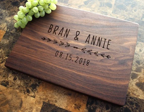 Think of tasks or hobbies you enjoy doing with your partner, whether it be as simple as making dinner or as thrilling as sky diving. Is there something that would help you two complete this task easier or more enjoyably? What about something that you two have been saying you've needed for a while? Let's say you enjoy cooking together! Gifts like the cutting board above are great to remind your partner that you not only love them but love spending time with them too.