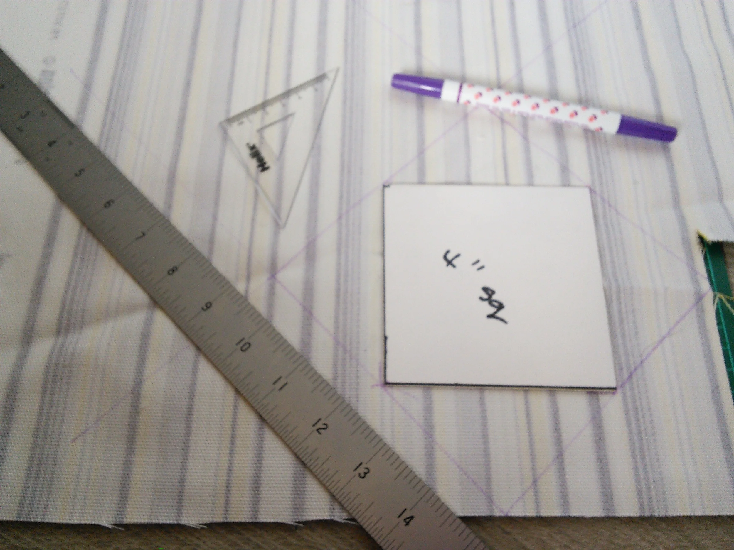 Stripy fabric sure made lining the mountboard edge up with the grain of the fabric easy.