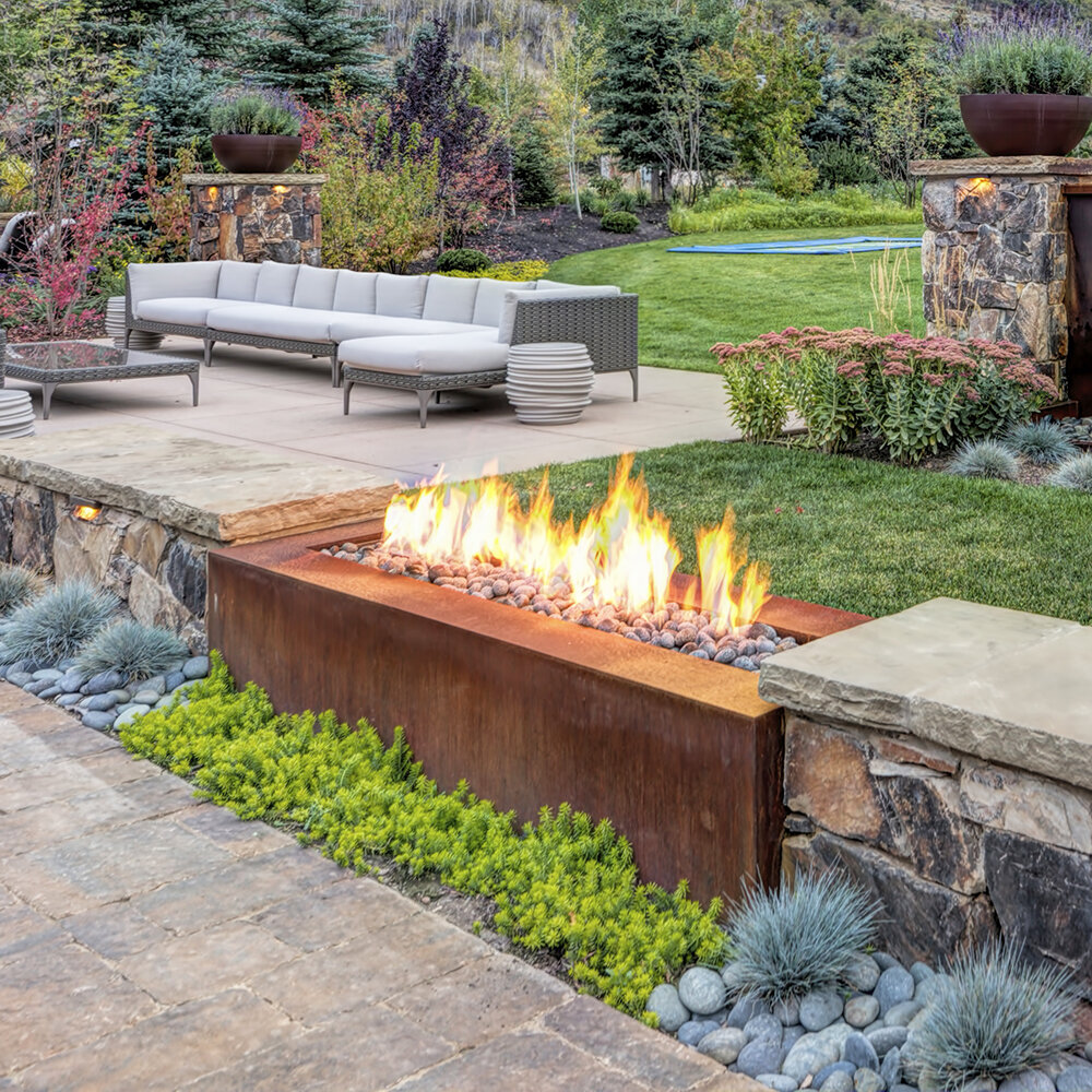 can you have a fire pit under a covered patio