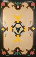 A floorcloth created to replace a beloved wool rug. The medallion in the center redesigned for the family retreat's logo.