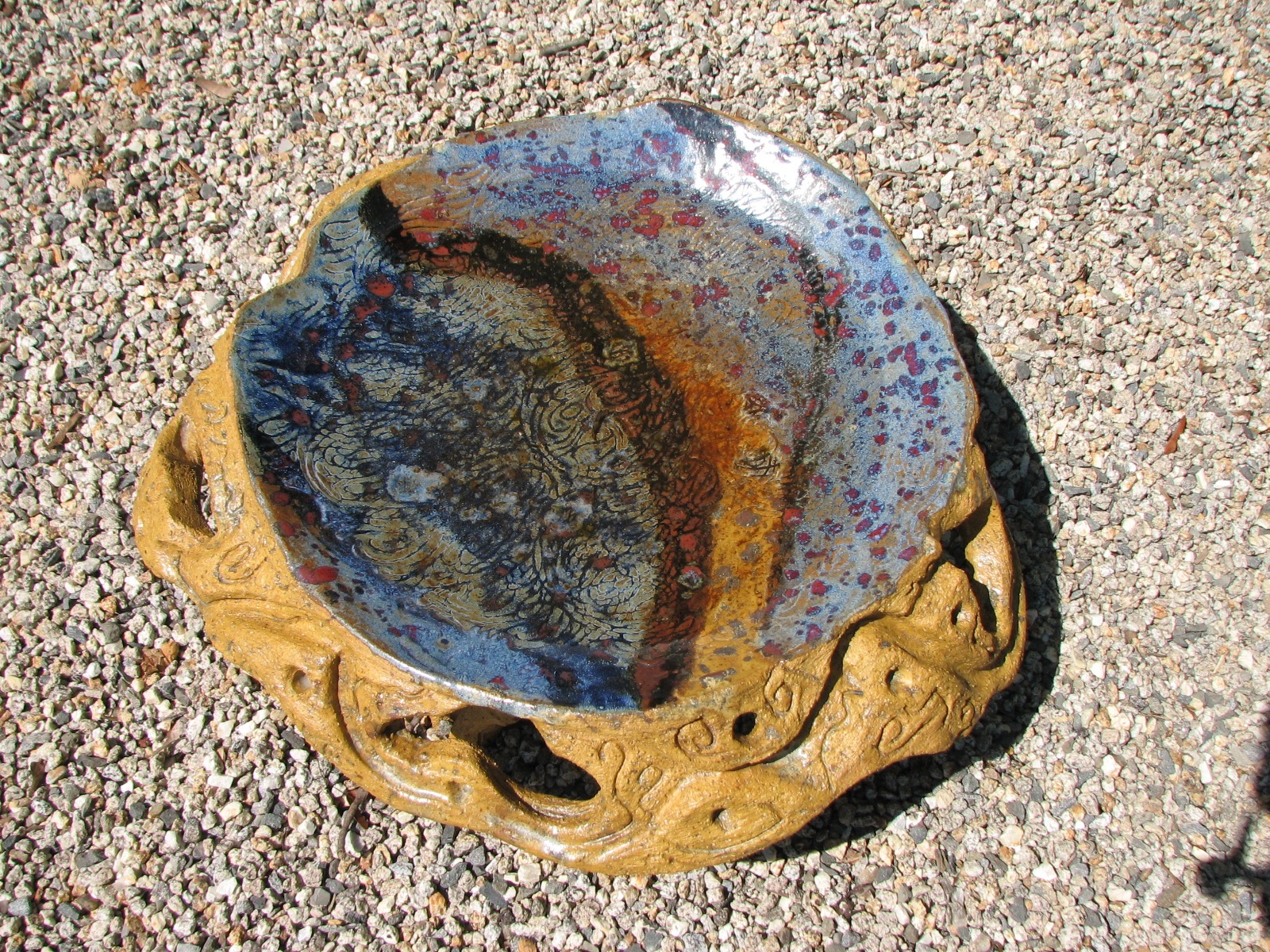 Carved low birdbath, $300.